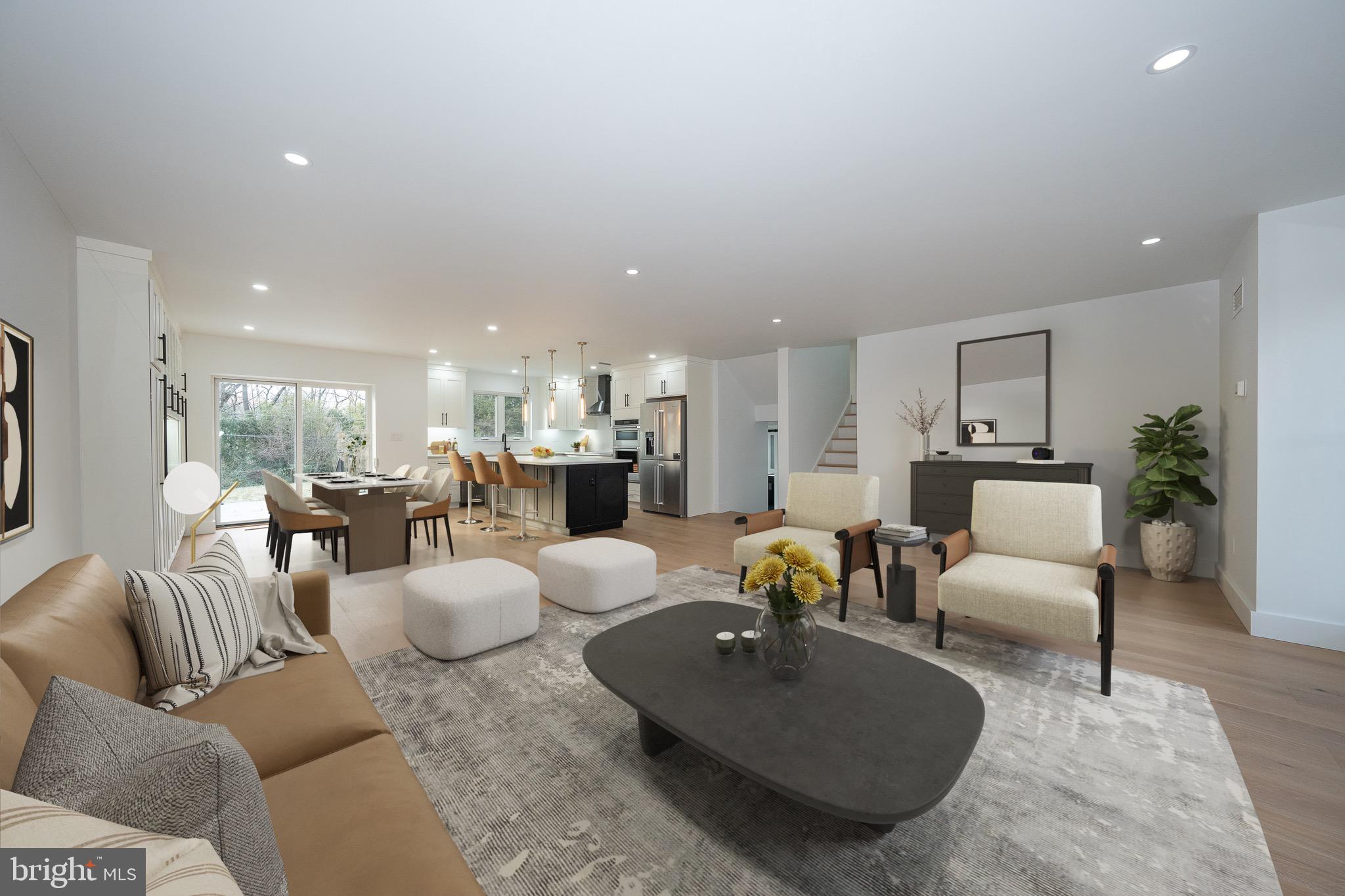 Luxury Living, Completely Reimagined — A Modern Masterpiece on a Private Cul-de-Sac  

Step into a home where every detail has been intentionally redesigned for today’s lifestyle. Fully renovated down to the studs, this 3,313 sq ft split-level foyer delivers a seamless blend of craftsmanship, modern comfort, and elevated style.

A bright, open-concept main level showcases 7" European Oak hardwood floors, an abundance of LED recessed lighting, and expansive Marvin windows and doors  that bring in exceptional natural light. The show-stopping kitchen features Century custom cabinetry, quartz countertops, a premium KitchenAid appliance suite, custom built-ins in the dining area, and an oversized island—perfect for both cooking and entertaining.

Ascend to the upper level to discover the primary suite oasis—a private retreat featuring a luxurious bath with heated floors, an oversized multi-head shower, soaking tub, dual vanity, and separate water closet. A spacious custom walk-in closet leads to an additional finished room ideal for a home office, yoga studio, or seasonal storage.

 The home also offers three well-appointed bedrooms, each with custom-fitted closets. Two bedrooms share a stylish hall bath with a bathtub, dual-sink vanity, and private water closet, while the third enjoys its own ensuite with a walk-in shower.

A half bath and custom laundry room/mudroom make daily living a breeze. The mudroom is designed with built-in cabinetry—ideal for keeping shoes, bags, sports gear, and all the kids’ essentials neatly organized. Whether you're coming in from the garage or heading out for the day, this stylish drop zone helps keep everything in its place

The lower level offers an inviting second living space with durable LVP flooring, a wood-burning fireplace, and a beautifully crafted custom bar complete with sink and additional Zephyr refrigerator—an entertainer’s dream. 

Every system in the home has been upgraded, including a brand-new 320-amp electrical service, full insulation upgrade, and dual new HVAC systems, delivering comfort and efficiency year-round.

 Exterior enhancements include new lighting and a modern garage door, and a large deck accessed from the dining area  making the home as impressive on the outside as it is within.

Some photos have been virtually staged to show the homes potential of the space.   The furniture and decor are representations and not included as part of the sale