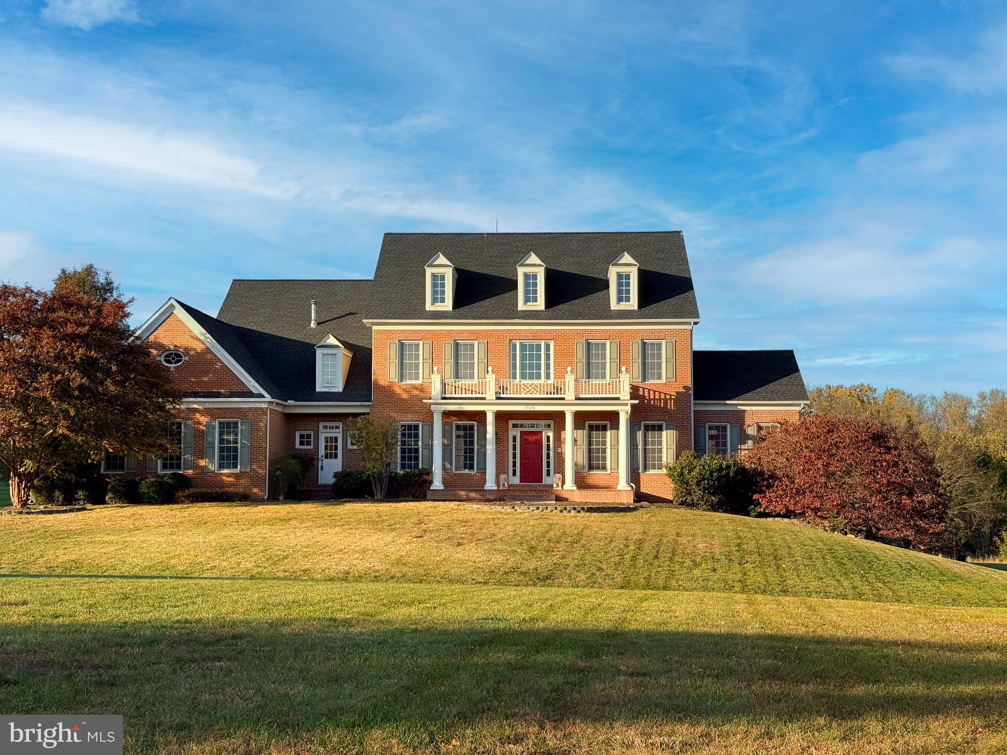 **Back on Market** Buyer's home sale contingency expired allowing a second opportunity to buy this stately home.  A well and septic, radon, and home inspection were just completed, and we are unaware of any issues.  This house is ready to move in now.  

Welcome to Silcott Meadow PL, this beautiful colonial built in 2005 sits on just over 5 sprawling acres.  This estate balances the perfect distance to amenities and serenity of seclusion.  Just outside your doorsteps are weekends of exploring local wineries, visiting farmers' markets, or enjoying fine dining.  For all outdoor enthusiasts, Purcellville offers nearby hiking trails, parks, and scenic weekend drives.

Your exquisite home begins its warm introduction with a long private driveway and front porch.  Choose your entrance between the formal entrance to greet your guests or an informal front access or three garage doors to ease the unloading of groceries.  

Upon formal entry, you are greeted by a beautiful front foyer and grand staircase.  This is your first introduction to approximately 7,700 finished square feet .  The rich browns of the vast wood flooring lead you past the formal dining room and living room.  Connected to the living room is a sunroom, a perfect flex space for art, homeschooling, or just enjoying a warm beverage.  The sunroom is the first of three stand-alone zones and separate climate-controlled spaces.  

Directly outside the sunroom is a newer composite deck to enjoy the beautiful Purcellville views.  Although the backyard has traditional cattle fencing, your dogs will be able to roam freely with the installed invisible fence.  Also, there is a ready connection for a generator in the event of a power outage.  

Just beyond the foyer and living room spaces, is a gourmet kitchen boasting stainless steel appliances with a newer Samsung refrigerator, GE profile oven and built in microwave, and Jenn-air range.  The kitchen comes with two dishwashers and a large island with seating plus extended granite buffet countertops.  The main kitchen  overlooks an extended breakfast nook, perfect for a large breakfast table.  Directly attached to the kitchen is a pantry and a mudroom with two hook ups for a washer and dryer on the main floor.

The family room connects the large open floor plan with a large office, both share the first of two gas fireplaces with the sunroom.  The family room is adjoined by a powder room and butler’s pantry/wet bar.  The private office has doors and highspeed internet throughout for those seeking a great teleworking space.  

Upstairs you will find 4 of the 5 large bedrooms which all have their own ensuite full bathrooms and the second of the three climate-controlled zones.  This is a rare upgrade during construction; the master suite has a large bathroom with walk-in shower, soaking tub, and two vanities.  The master also has two walk-in closest and sitting area outside of the master bath.   The second floor also includes the primary washer and dryer.  

The enormous basement has a full wet bar, a 5th bedroom with ensuite full bathroom and approximately 600 square feet of storage.  The walk-out basement is great for entertaining and for hosting guests or sporting events.  The basement has the second of two gas fireplaces creating an atmosphere for entertaining or down time during a snowed in staycation.

Do not miss out on this opportunity for small town charm and modern luxury!