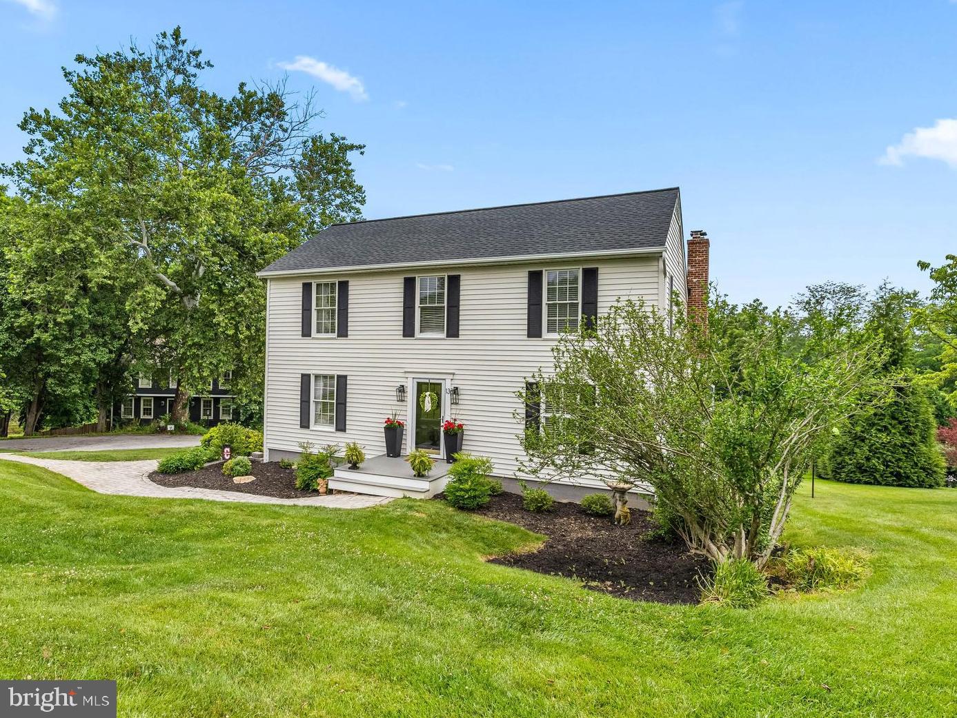 A colonial in Village Green! This nicely updated 4 bed/2 Full and 2 Half bath home is located a short walk up the hill from Riderwood Elementary School. The first floor features an entry level bedroom, powder room, laundry/mud room, family room with vaulted ceiling and fireplace, separate kitchen and dining rooms and very recently built deck off the rear sliders! The finished basement has a walkout to the back yard and a half bath, plumbed and primed to be a full, just needs shower fixtures. There's also a large unfinished storage room. Upstairs you'll find a traditional lay out 3 bedrooms and 2 bath setup with a primary en-suite bath and walk-in closet! The roof and vinyl siding have both recently been replaced as well. One of Towson's best neighborhoods!