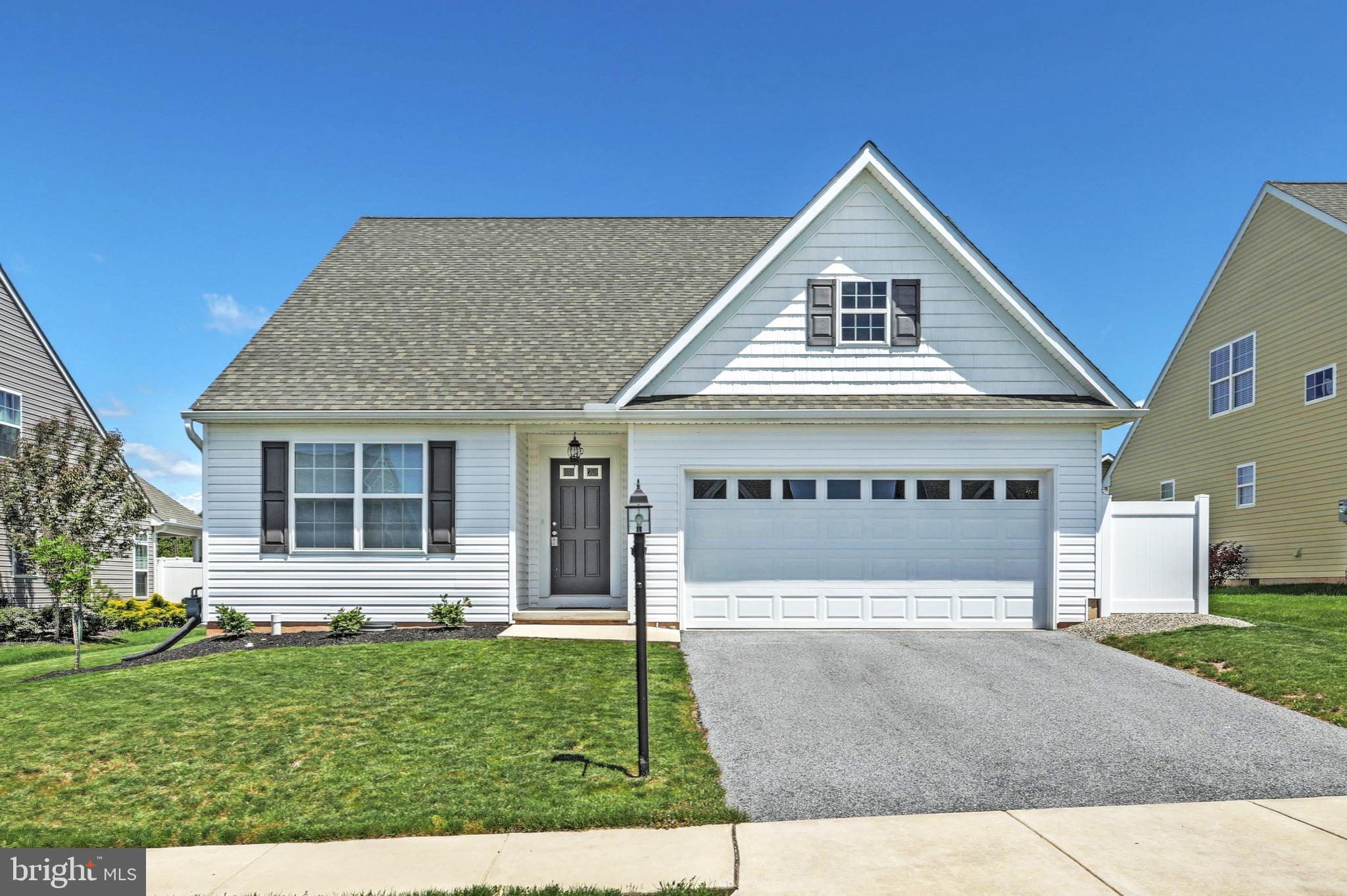 Move-in ready home in Northeastern Schools. If you are looking for easy and beautiful first floor living, then this is the home for you! Home shows like NEW, Featuring a great open floor plan with hardwood flooring throughout, gas FP, granite counters, vaulted ceiling in LR, master suite with private bath & walk-in closet, 3 BR's, 3 full baths, laundry, SS appl. including fridge and so much more.
