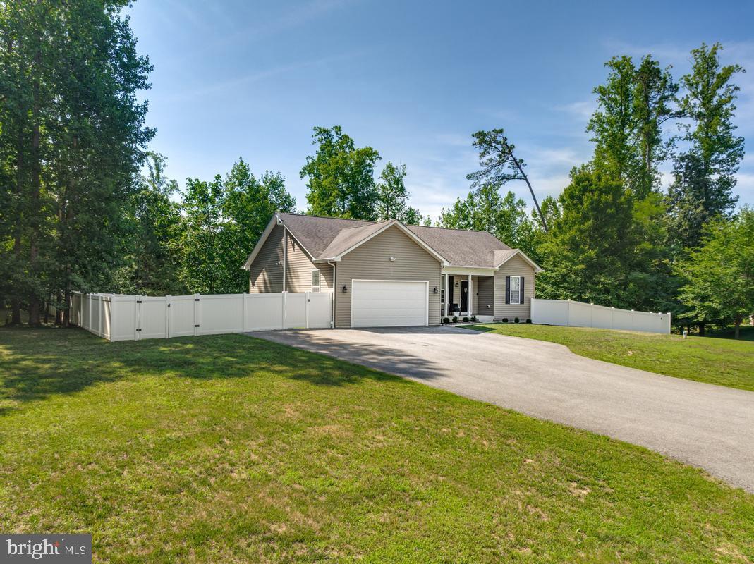 WOW ! ELIGIBLE VA HOMEBUYERS MAY QUALIFY TO ASSUME A 3% FIXED INTEREST RATE VA HOME LOAN - SAVING THEM THOUSANDS OF DOLLARS IN INTEREST ! - THIS HOME IS ALSO ELIGIBLE FOR USDA NO MONEY DOWN FINANCING FOR QUALIFYING HOME BUYERS ! - WOW ! -  Peaceful and move-in ready, this beautifully updated home sits on a quiet 1.15acre lot with no HOA . Inside, you’ll find a bright, refreshed interior with brand-new luxury vinyl plank flooring, recessed lighting, modern finishes, and a spacious kitchen designed to impress. The kitchen features 42-inch cabinets, new granite countertops, a new granite backsplash, stainless steel appliances, and a center island with plenty of prep and gathering space.

The primary suite offers a comfortable retreat with a large walk-in closet with organizer, separate walk-in linen closet, and a master bath with double vanities. The finished walk-out basement adds valuable living space and includes 9' ceilings , a full bathroom, 3 separate storage rooms, a huge recreation room, a home office, or multi-purpose use room that leads to a sliding door to the backyard.

Outdoor living is easy with a new 12' x 20' vinyl composite maintenance free deck overlooking the backyard, enclosed by a new 6-foot-high vinyl privacy fence. The extra wide paved driveway offers plenty of parking space for boats, RVs, trailers, and additional vehicles (NO HOA !)  Its just a short 2 mile drive to a public boat ramp on the beautiful Patuxent  river !

Additional features include epoxy garage flooring, a new HVAC system, 2-year-old water heater, 13-year-old roof and a water softener

 A great commuter location with easy access to all points in Southern Maryland ,  Northern Virginia , Joint Base Andrews , Joint Base Bolling, Patuxent Naval Air Station and most of downtown D.C.

This spotless home  offers space , privacy, low maintenance , several updates / upgrades and convenience all in one.