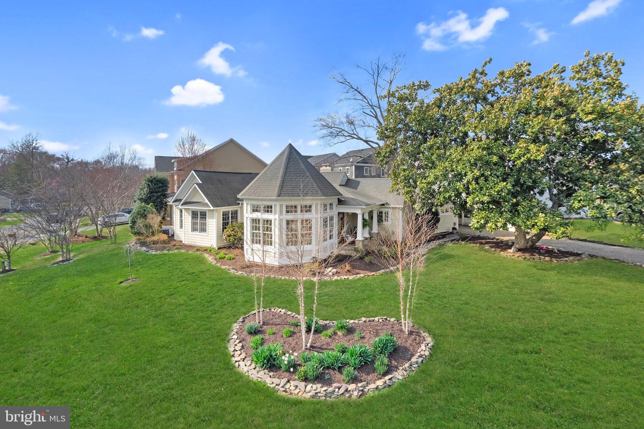 8118 Yorktown Drive is a breathtaking, custom 4-bed, 3.5 bath home on a sprawling .3 acre corner lot showcasing nearly 4,000 SF. When you step foot inside this home, you will immediately understand how special it is. The thoughtfully designed floor plan, including a large addition and remodel, fully absorbs you into the space, almost forgetting that another world exists outside this beautiful home. 

Some of the notable interior features include: The bespoke octagon room with cathedral, wooden ceilings and centerpiece fireplace; The streamlined connection between dining, kitchen and family rooms which accesses the back yard - making it an entertainer’s dream; The bedroom suite tucked on one side of the home; The Primary Suite with large en-suite bathroom, walk-in wardrobe & dressing room; and additional large walk-in closet; The additional large bedroom suite with built in shelving, desk and en-suite bathroom; The mud-room/laundry right off the carport (so convenient!); The LL guest room / rec room / flex space with connected 628 SF storage room; And, finally, the massive attic space for even more storage (could be finished for more living space one day). 

The fully-fenced back yard is a showstopper - enveloped in privacy with extensive flagstone hardscape and 2 seating areas, beautiful gardens, and a storage shed. In addition to the paver driveway, there is an additional parking pad with a 50-amp electric post. This home is only .3 miles from the Mount Vernon Park Association, which offers a pool membership for purchase. Hollin Hall Shopping Center is supremely convenient, only .5 miles away and includes a Safeway, Village Hardware, Walgreens, River Bend Bistro, Hollin Hall Variety Store (local fave!!) and much more. 

Some recent updates include: remodeled Primary Bathroom; finished LL flex room; new Miele dishwasher; new clothes dryer; re-finished hardwood floors; re-lay flagstone patio; new exterior AC unit; and many electrical updates throughout. This home is currently zoned for Waynewood Elementary! All square footage is approximate using tax records for Above-Grade and lidar technology for below-grade; see floor plan.