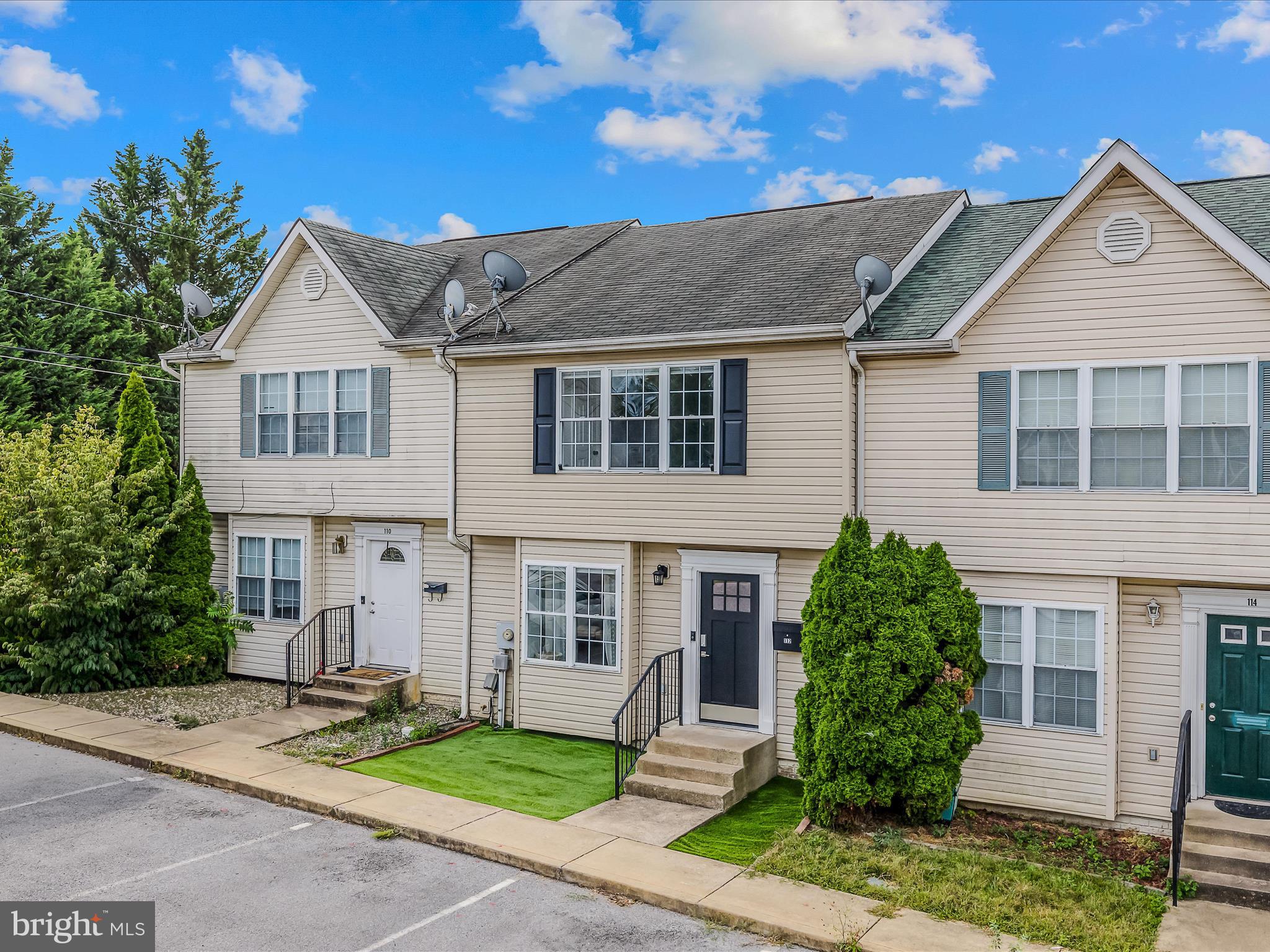 Welcome to 112 Georgetown Square! This beautifully updated 3-bedroom, 2.5-bath townhome perfectly combines style, comfort, and convenience. Nestled in the heart of Martinsburg, you’ll enjoy easy access to I-81, downtown, the MARC train, restaurants, shopping, and community parks—making this an ideal location for both commuters and those who love being close to everything. Step inside to find fresh paint throughout and newly installed, low-maintenance LVP flooring that flows through the spacious family room, kitchen, dining areas, and continues to the second level. The large kitchen is a true gathering space, featuring beautiful granite countertops, stainless steel appliances, modern farmhouse lighting, and direct access to the rear deck—perfect for grilling or relaxing outdoors. The fenced backyard, complete with artificial turf for low-maintenance living, offers a private spot to unwind or entertain. Upstairs, the generously sized primary suite is filled with natural light and features a walk-in closet and a fully renovated en suite bath. Two additional bedrooms and a refreshed hall bath provide plenty of space for family, guests, or a home office. Unlike most in the community, this home includes a full unfinished basement. Adding approximately 640 sq. ft. with a bathroom rough-in—ideal for future living space, a home gym, or workshop. Additional perks include updated systems (new AC, HVAC blower, and water heater in 2023), a renovated half bath, new fence and gate, and the rare benefit of NO HOA! Two assigned parking spaces are conveniently located out front, with guest parking nearby. With thoughtful updates already in place and big-ticket items recently replaced, this home is truly move-in ready and waiting for its next owner. Schedule your showing today—you won’t want to miss it!