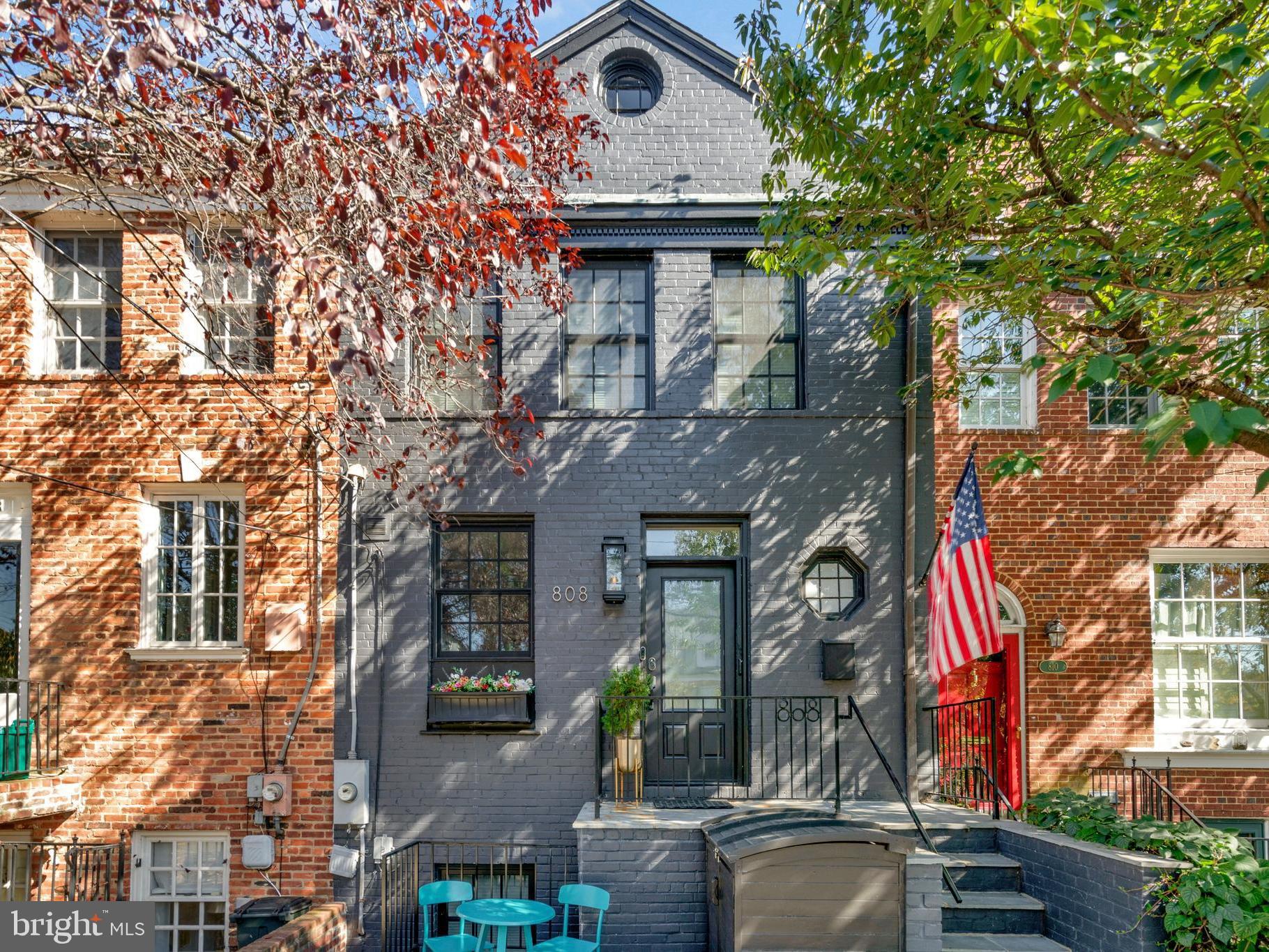 Stunning 5 bedroom, 4.5 bath home with dedicated parking and an expansive lot bordering permanent Jones Point parkland! This must-see home offers the convenience of a walkable community and a private, serene oasis which is truly a rare find in Old Town. Renovated in 2018, the gorgeous chef’s kitchen features white shaker cabinets, marble backsplash, stainless steel appliances, pot filler, wine refrigerator, and ample counter space with a mahogany island and peninsula with counter seating. The spacious and light-filled main level affords easy living with seamless flow between the kitchen, dining room, and living room. Enjoy the cozy gas fireplace or peaceful back deck with direct gas line for grilling and extendable awning overlooking the lush park landscape. The upper level is thoughtfully designed with 4 bedrooms, 3 full baths including 2 en suite, large walk-in laundry room with utility sink, abundant closet space and storage. A bonus is the Trek roof deck located off the 4th bedroom with winter river views and beautiful foliage in the summer. The fully finished lower level, with a private front and back entrance is a versatile, multi-purpose space; with the 5th bedroom, full bath, second washer and dryer, and kitchenette, it is an ideal guest or au pair suite. In addition, there is an extensive family room with gas fireplace and access to the back fenced flagstone patio and rolling grass back yard beyond. Don't miss this pristine home in move-in condition in a premier location just steps to the Mt. Vernon Trail, parks, the Old Town waterfront and close proximity to public transportation, Reagan National Airport and Washington, DC.