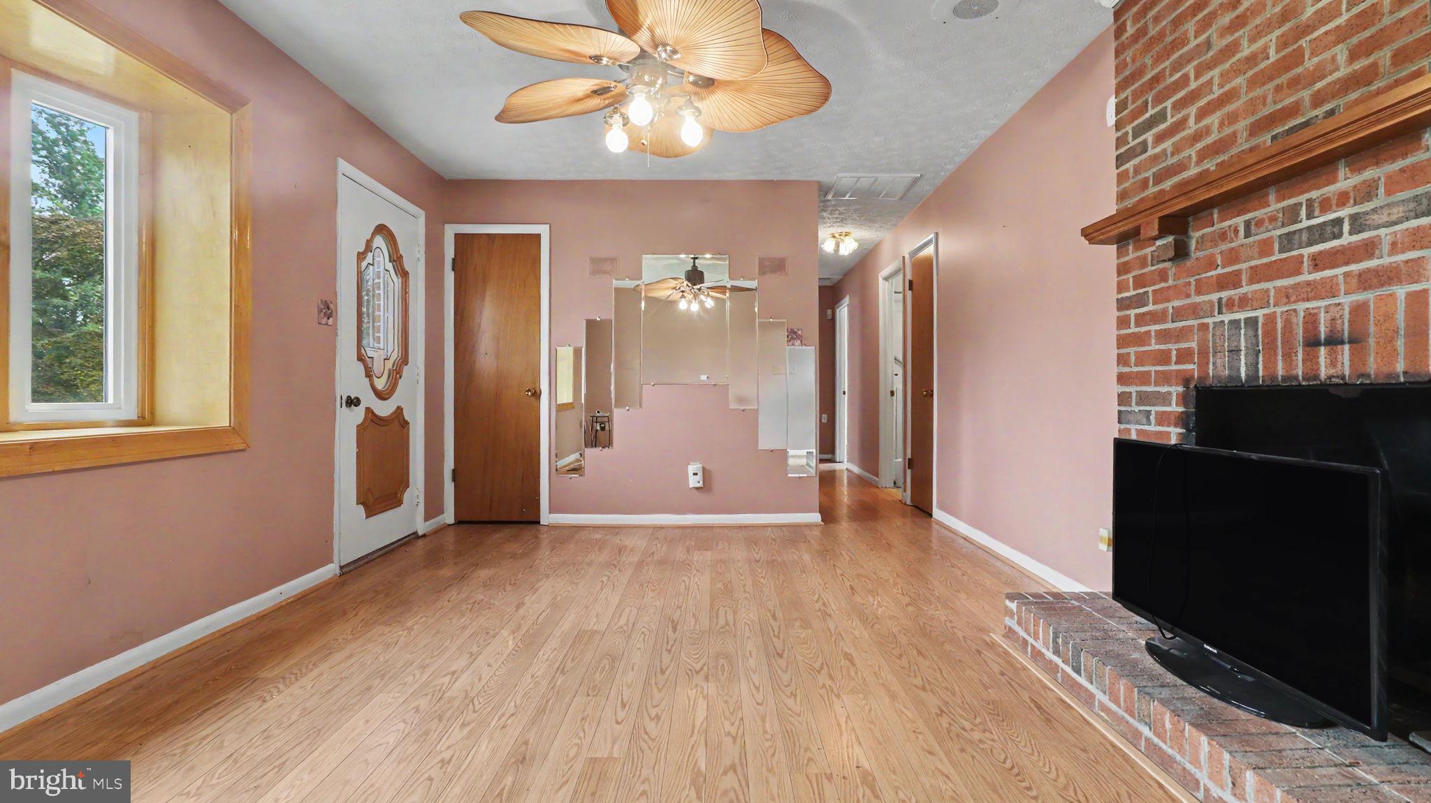PRICED LIKE A CONDO!  Wonderful, one-family owned home.  All BRICK rambler on a quiet and serene 1.3 acre lot on a private road.  Owners have taken great care to make it move-in ready.  Big bay window in the living room, sunroom/family room on the rear, huge 2-car garage with storage space, too!  Close to restaurants, carryout, gym, post office and more!  Be in Fort Washington and Waldorf in minutes!  Commuter bus to DC near by.