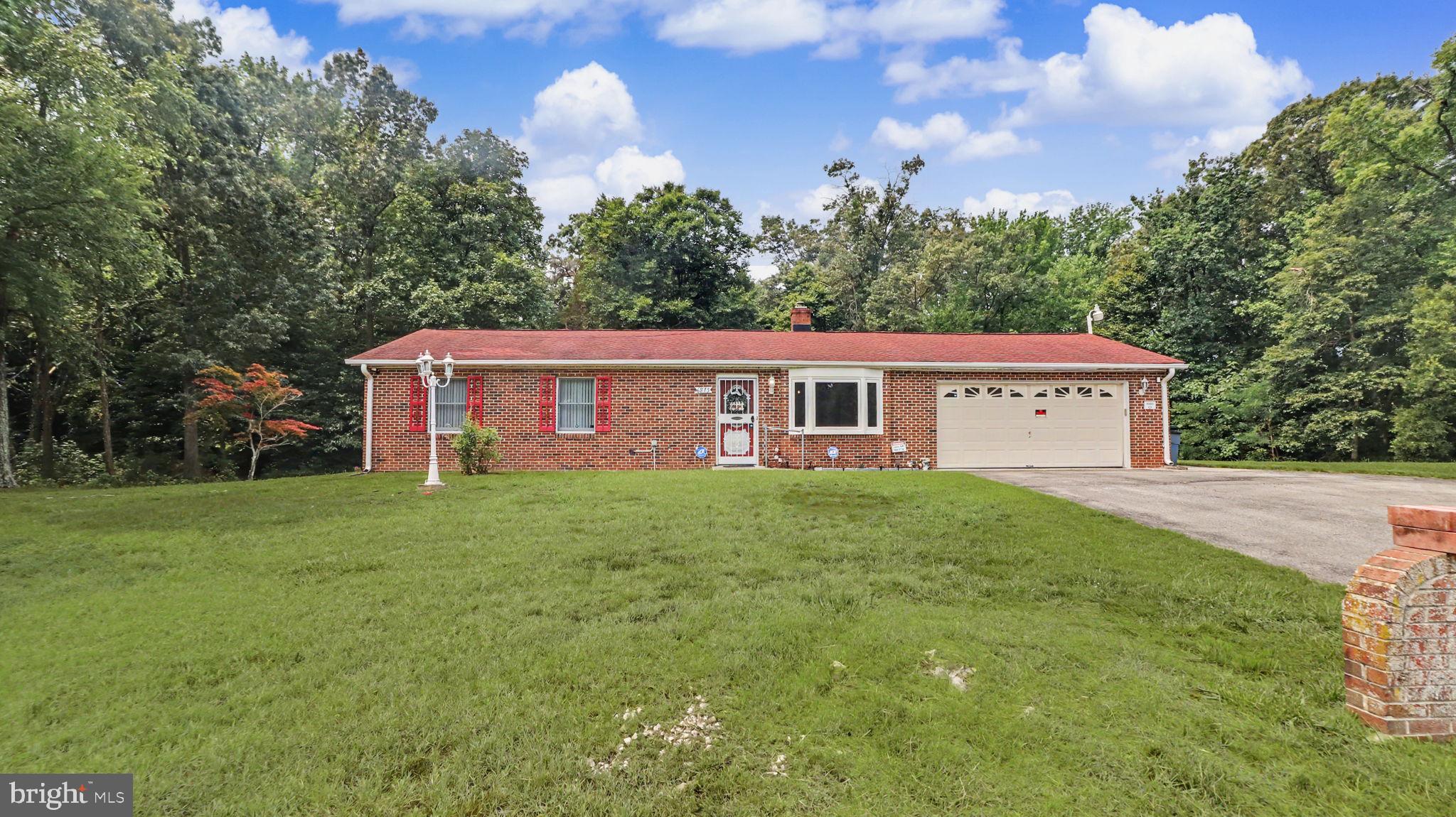 PRICED LIKE A CONDO!  Wonderful, one-family owned home.  All BRICK rambler on a quiet and serene 1.3 acre lot on a private road.  Owners have taken great care to make it move-in ready.  Big bay window in the living room, sunroom/family room on the rear, huge 2-car garage with storage space, too!  Close to restaurants, carryout, gym, post office and more!  Be in Fort Washington and Waldorf in minutes!  Commuter bus to DC near by.
ALSO FOR SALE -- ATTACHED ONE ACRE WOODED LOT.