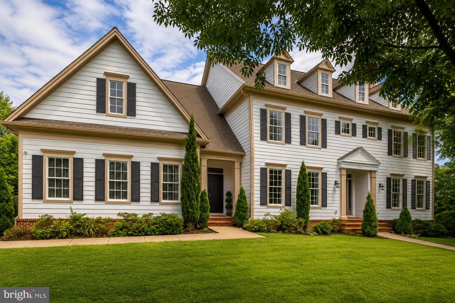 Open Sunday! 2-4 pm!
Live Differently isn't just the Town of Herndon's motto—it's exactly what you'll do in this spectacular Downtown Herndon home.
With more than 6,300 square feet of beautifully finished living space, this home is packed with details that are getting harder and harder to find. And when you look at the price per square foot, it's one of the best values you'll find anywhere around. You simply won't find this much house, this level of quality, and this location at a better price.
The feature everyone talks about? Every oversized bedroom has its own ensuite bathroom...and every bathroom has its own linen closet. Seriously. It's one of those things you didn't know you needed until you have it.

From the moment you walk in, you'll notice the sand-in-place real hardwood floors throughout most of the main level, tall ceilings, a sweeping staircase with gorgeous metal balusters, and paint colors that just feel right. The living room could easily become your favorite work-from-home spot with its oversized windows, elegant moldings, and wood-burning fireplace.

The dining room has plenty of space for all your furniture—and all your favorite people.

The kitchen is a dream if you actually like to cook (or just like having a beautiful kitchen). There's an incredible amount of prep space, 48 cabinets and drawers, under-cabinet lighting, double wall ovens, a Bosch dishwasher, JennAir cooktop with vent, island beverage fridge, and a huge walk-in pantry. There's even a butler's pantry that's already pre-plumbed for a sink, plus room for a big breakfast table where everyone naturally gathers.

Just off the kitchen is an enormous family room with more oversized windows, brand-new carpet, and a second wood-burning fireplace. Whether it's football on Sunday, movie night, or curling up with a good book, this is the room everyone will want to be in.

And I still haven't found a mudroom/laundry room bigger than this one. There's tons of space, a utility sink, and yes—the Samsung washer and dryer convey.

Upstairs is where this house really shines. Four generously sized bedrooms. Four private bathrooms. No sharing. The primary suite feels like a true retreat with its 10-foot tray ceiling, ambient lighting, two large walk-in closets, and a spa-like bath featuring separate vanities, a soaking tub, and a walk-in shower with dual shower heads and a built-in bench.

Need even more space? The finished lower level adds another 1,800+ square feet, complete with a kitchenette featuring granite countertops and a full-size refrigerator. Game room, guest suite, home gym, media room...whatever you need, there's room for it.

Outside, the home has incredible curb appeal with classic architecture, beautiful landscaping, HardiePlank siding on all four sides, a brick water table, and a large driveway.

Then there's the location. Living in Downtown Herndon is what makes this home truly special. You're just two blocks from Jimmy's Old Town Tavern, Aslin, Izzi Pizza, Sully's Pour House, The Breeze, and so much more. Wednesday night rides with Green Lizard Cycling. Tuesday and Friday concerts on the Town Green all summer. The Thursday Farmers Market. Homecoming. The Herndon Homes Tour. WinterMarkt. It's the kind of town where there's always something going on and it's easy to feel part of the community.

Living here really is different...and once you do, you'll understand why people love calling Downtown Herndon home.
*many photos have been virtually staged*