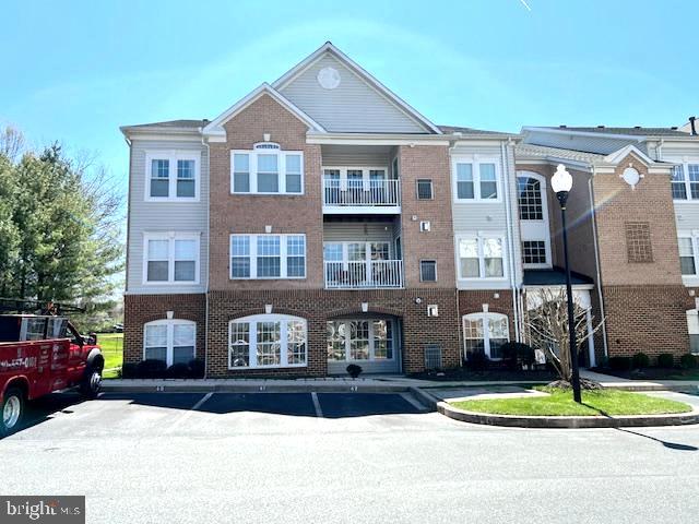 True first-floor living with "walk-right-in"  access ( no need to enter a main building hallway).You will love the location of this one.... Ability to park directly  in front of the unit for easy grocery/item transport; also  includes  a patio to sit out on.  Inside...has a gas fireplace w/mantle  in living room! Kitchen has beautiful wooden look floors and table space and double windows for lots of light!  Equipped with a full size washer and dryer! Primary bedroom  with a spacious layout featuring a sitting  area and a huge walk-in closet! The Primary bath  recently updated with a new walk-in shower.  Second Bedroom is conveniently located next to a full bath with a tub and shower .  Ample  storage space throughout various  closets.  Shows great! 
55+ Senior living close to downtown Bel Air with easy access to restaurants, shopping , library and  lots more!!  Come and  start enjoying yourselves ! PARK ONLY IN MARKED "VISITOR" SPACES