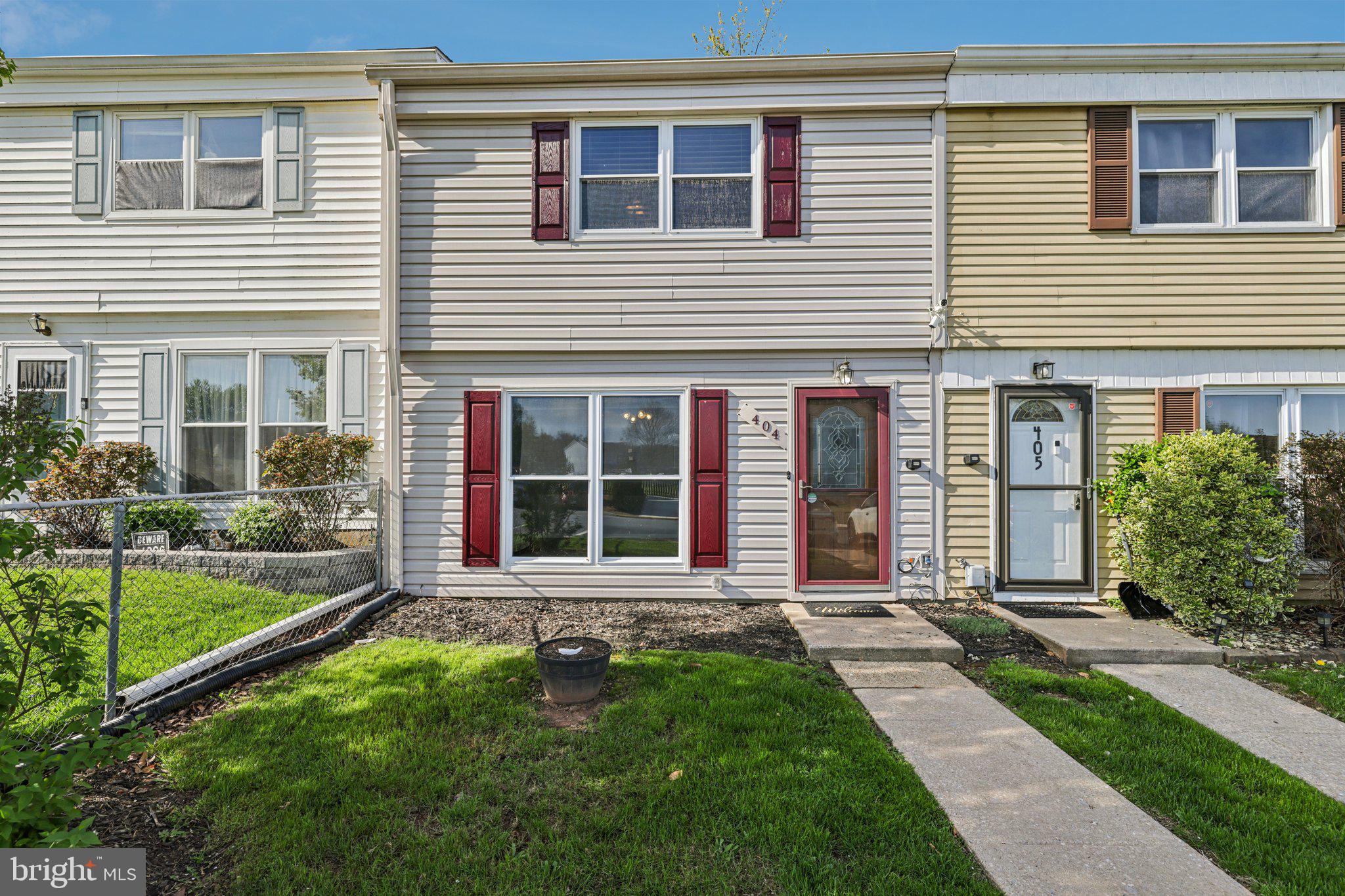 Welcome to 404 Red Tulip Court, a charming and well-maintained townhome tucked on a quiet cul-de-sac in the heart of Taneytown, offering an ideal blend of comfort, convenience, and value. This inviting 3-bedroom, 1.5-bath residence features a bright traditional layout designed for easy everyday living. The main level has LVP flooring throughout and offers a spacious living area filled with natural light, a convenient half bath, and a renovated kitchen with 2021 stainless steel appliances (2021) with adjoining dining space—perfect for casual meals or entertaining. Upstairs, you'll find three comfortably sized bedrooms and a full bath, including a generous primary bedroom with excellent closet space. With no basement to maintain, the home provides efficient, low-maintenance living throughout. Step outside to enjoy the fenced rear yard and private patio, which includes a large shed for all of your outside toys and tools.  This is backyard is ideal for grilling, gardening, or relaxing outdoors. Located near local favorites like Memorial Park, Roberts Mill Park, and the Taneytown History Museum, residents also enjoy easy access to shopping, dining, and daily conveniences in downtown Taneytown and nearby Westminster. Commuters will appreciate proximity to MD-140, offering convenient routes to Westminster, Frederick, Gettysburg, and major employers throughout Carroll County and surrounding markets. A fantastic opportunity to own a move-in-ready home in an established community with small-town charm and everyday accessibility.  HVAC 2022, HWH 2022, and Roof 2023!  Check out the virtual tour!