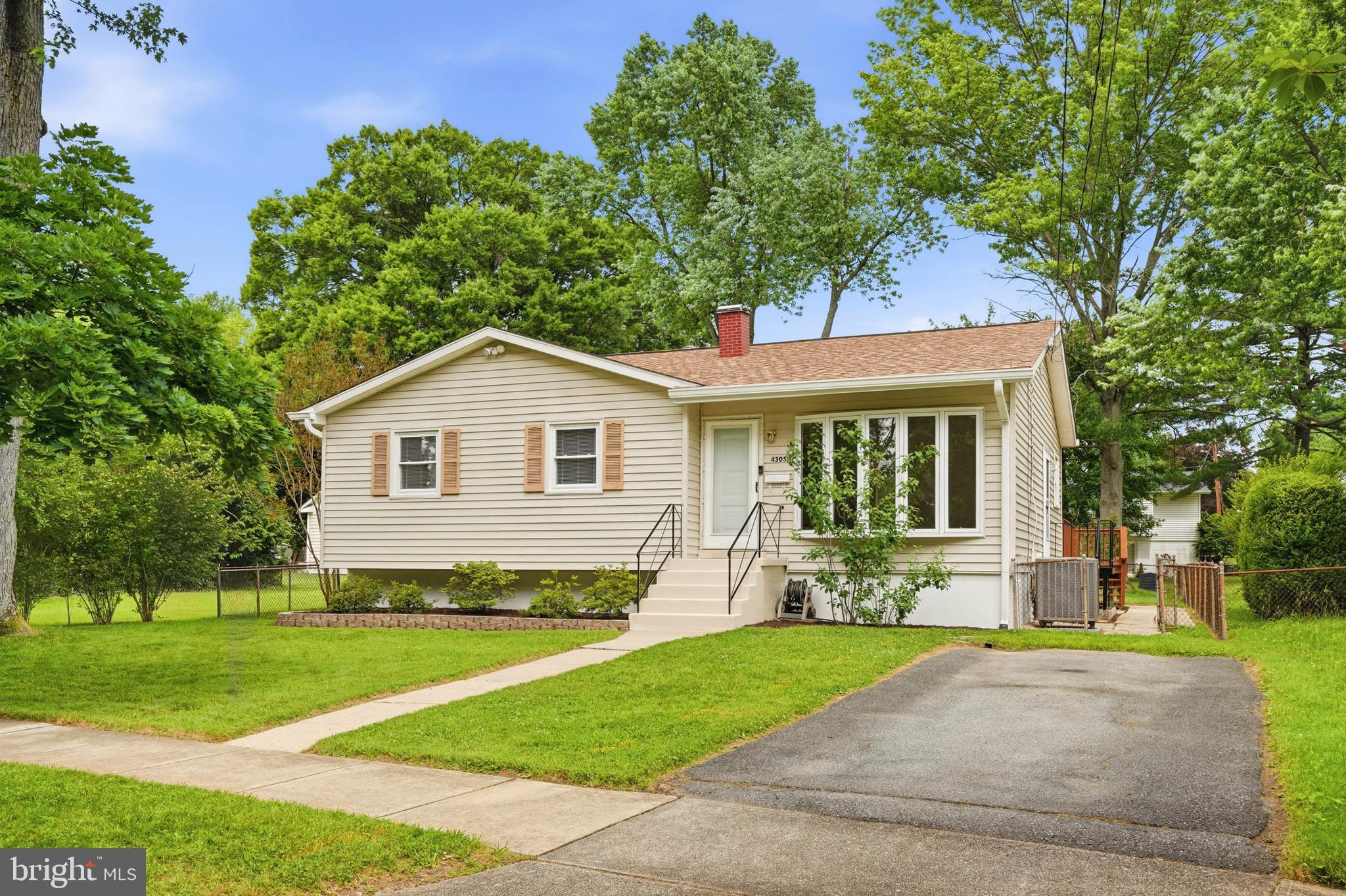 OPEN HOUSE SATURDAY JUNE 13th (1-3pm) .... Great value and opportunity in this updated and well maintained rambler in sought after Wheaton Woods!  Set on a quiet street, this charming home features main level living with three large bedrooms, a beautifully updated full bathroom, a spacious living room, dining area, and a renovated gourmet kitchen with plenty of counter and cabinet space! A finished lower level includes a sizable family room, half bathroom, laundry room, and a utility room with plenty of storage and a walk-up entry to the side yard! A premium, fully fenced backyard includes a large shed and is perfect for at home gardening or recreation and can be enjoyed from a large deck that is perfect for summertime entertainment! Find recently refinished hardwood floors, fresh paint throughout much of the home, and a variety  of other recent updates!  Enjoy close proximity to area schools, local shopping, Rock Creek Park trails, and Metro! Come quickly!