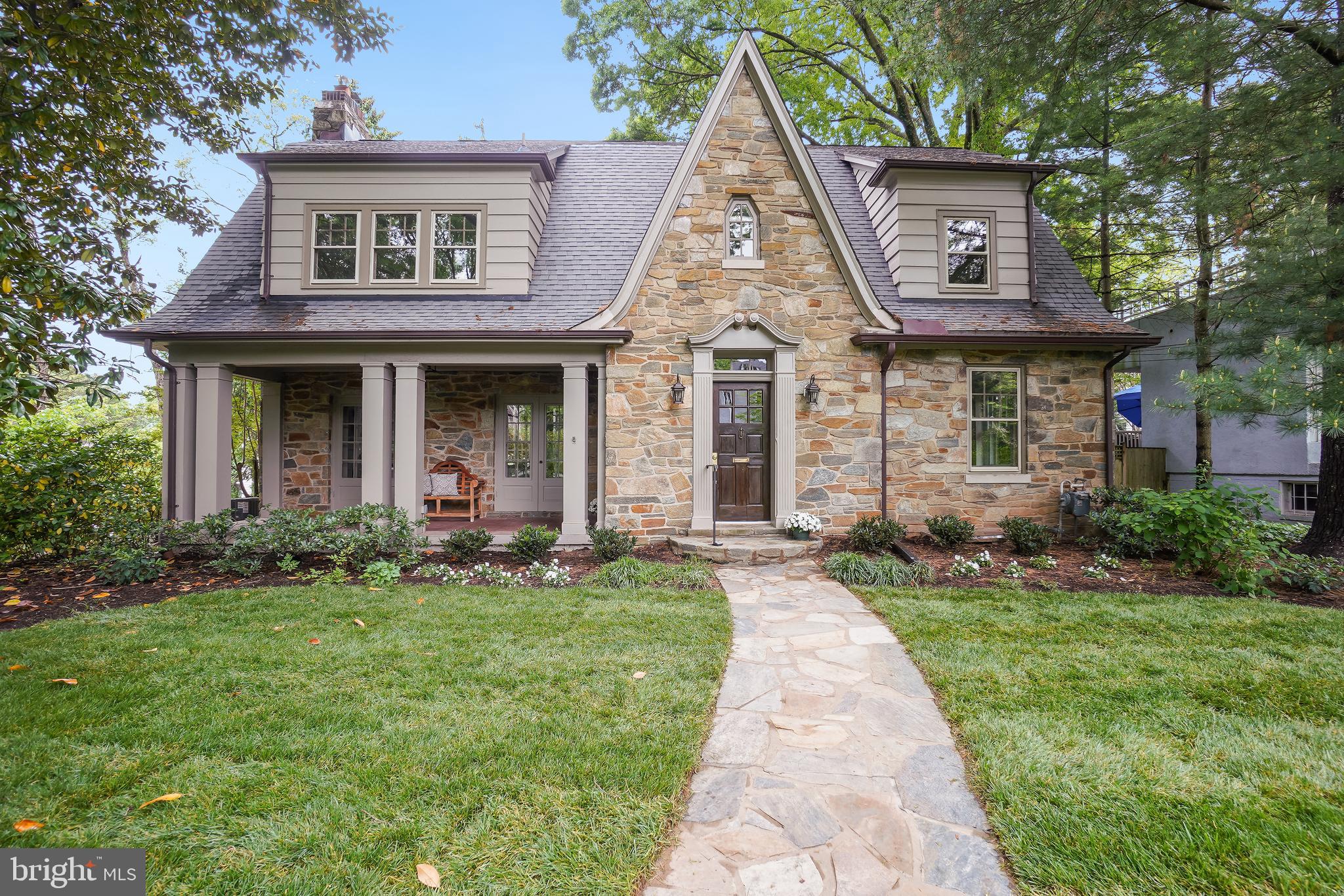 Amazing New Price! Welcome to 4606 Langdrum Lane, a timeless beauty in a coveted neighborhood. Perfectly positioned within walking distance of two metro stations, shops, and restaurants, this 4,300 SQ FT home spans four expansive levels. It has undergone recent renovations, blending modern updates with timeless charm, while also offering an excellent opportunity to add your personal touch. 

Featuring six bedrooms and 3.5 bathrooms, with an inviting front porch and an oversized deck patio in a fenced yard.  The presence of a two-car garage and an extended driveway enhances the practical appeal of this distinguished residence.

Beautifully refinished wood floors on the first 3 levels and numerous large windows, bathing the interior in natural light. The centerpiece is a generously sized living room equipped with a stone fireplace and two sets of French doors that open onto the charming front porch. Adjacent to this, the elegant formal dining room, accessible via French doors from the foyer, is perfect for hosting large gatherings or sophisticated dinners.

The kitchen features tray ceilings, recessed lighting, new countertops, backsplash, and all-new appliances. A convenient porch off the kitchen provides seamless access to the fenced yard, making outdoor living and entertaining a breeze.
 The second floor of the home features four spacious bedrooms and two full baths, including a luxurious primary suite complete with a brand-new, elegantly appointed primary bathroom.

Two additional large bedrooms on the third floor and ample space for an additional full bathroom, offering plenty of room for growth and customization. The lower level, which is easily accessible via a walkout, presents a spacious family room, a full bathroom, laundry room, utility room, and direct access to the two-car garage, combining convenience with comfort.

Outside, the professionally landscaped yard becomes a peaceful retreat where you can relax and enjoy your leisure time amidst beautiful surroundings. This home’s thoughtful layout and inviting spaces make it a perfect sanctuary for both lively gatherings and quiet moments alike.

The 9603 sq ft lot is a rare find in Chevy Chase and this home provides easy access to an abundance of dining and shopping options and steps to The Capital Crescent Trail, Norwood Park and Somerset Elementary School.

 With its unique features  and a prime location, this esceptional property is sure to be in high demand.  Don't miss out on this incredible opportunity.