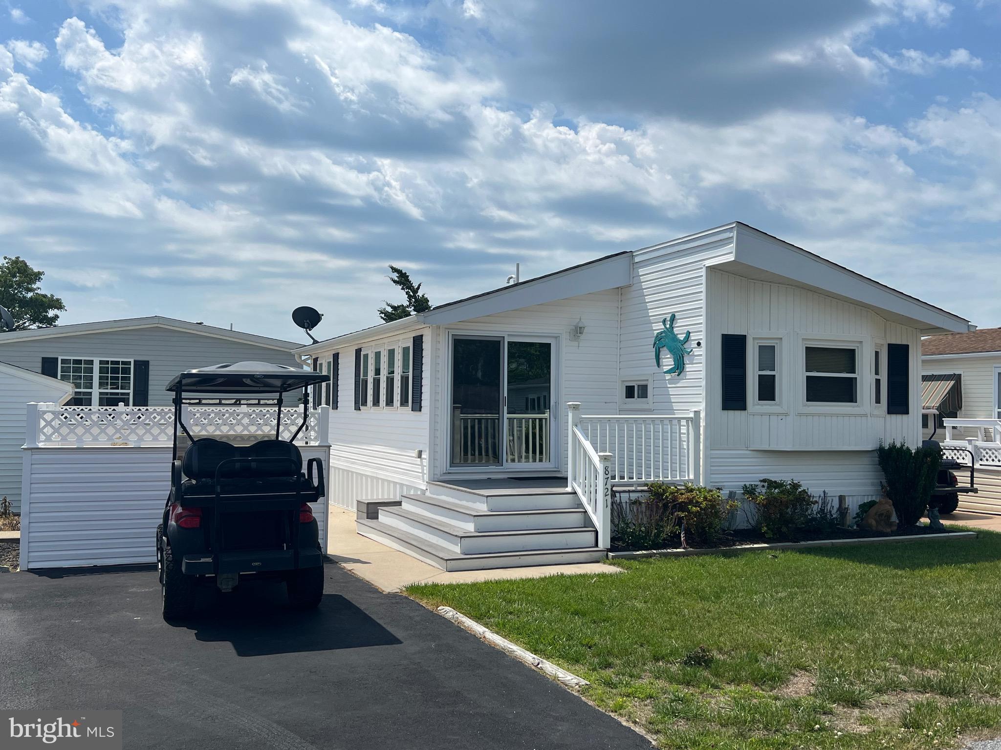 Location, Location Location!  This Well Kept Turn Key  2 Bedroom Cottage is only steps from Clubhouse, Pool & 1000ft. Pier! New Roof in 2025! Recent Updates include: HVAC, Ductwork, Windows, Doors , Hot Water Heater, Sinks & Toilet. Maintenance  Free Composite Deck & Vinyl Railing. Courtyard & Shed, Plus a Golf Cart!