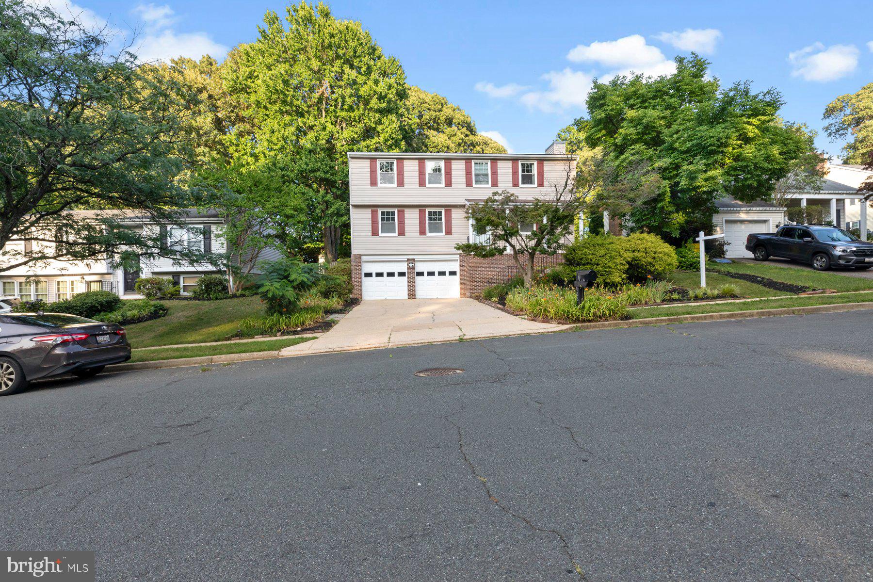 Welcome home to this charming and spacious four-bedroom, two-bath colonial offering the perfect blend of comfort and functionality. Filled with abundant natural light, this inviting home features a thoughtful layout with a warm combination of hardwood floors and plush carpeting throughout.

The bright and airy living spaces flow effortlessly, creating an ideal setting for both everyday living and entertaining. The generously sized bedrooms provide plenty of room to relax, while ample closet space ensures storage is never an issue.

Step outside to a spacious rear deck overlooking the backyard—perfect for morning coffee, summer barbecues, or simply unwinding at the end of the day. A two-car garage offers additional convenience with plenty of room for parking and extra storage.

With its spacious interior, comfortable living areas, and welcoming outdoor space, this split-level home is ready for you to make it your own.