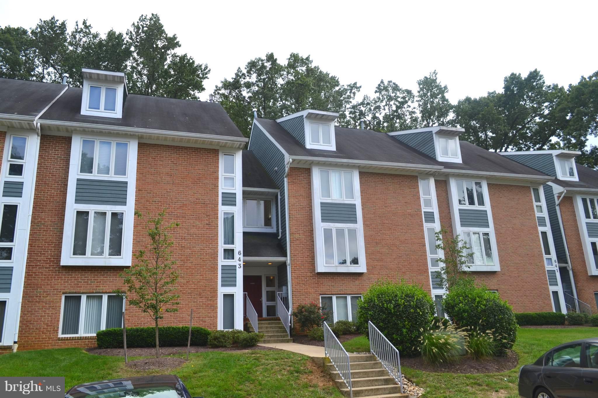 Stylish 2 bedroom / 2 bath condo with lush, wooded balcony view!  Nine foot ceilings, gas fireplace, stainless steel appliances, open floor plan, and neutral colors.  Many recent upgrades including new Pergo flooring throughout, fresh paint throughout, and new stainless steel stove.  Master suite with walk-in closet and tons of light.  Private balcony overlooking woods.  Shows beautifully!