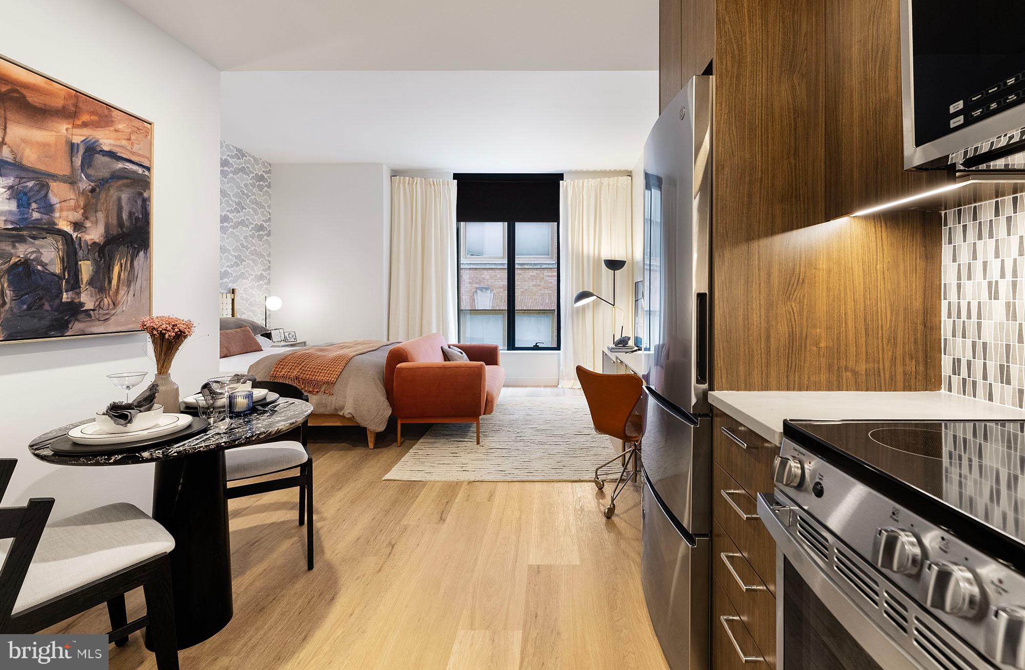 Center City’s Crown Jewel: 210 South 12th. A once-in-a-lifetime opportunity.
Nestled in the vibrant heart of Midtown Village, 210 South 12th stands as a beacon of modern living, embodying an unparalleled residential experience. This prestigious address is renowned for its sophisticated living spaces, which include everything from sleek studio apartments to expansive three-bedroom penthouses and everything in between.

The stunning architecture of 210 South 12th was finely crafted by a team of elite design professionals headlined by award-winning firm RSHP, formerly known as Rogers Stirk Harbour + Partners, Midwood Design Studio, and BLT Architects. World-class elegance combines with the character and soul of one of America’s most vibrant cities to create 32 floors of innovative living.

Located within the Washington Square West neighborhood, this apartment community integrates modern design and convenience into every element, offering studio, one-bedroom, one-bedroom den, and two-bedroom apartments as well as impressive three-bedroom penthouses. Residents are greeted with a 24-hour attended lobby with concierge services, providing a welcoming entrance. At  210 South 12th, you’ll enjoy personalized comfort year-round thanks to state-of-the-art air conditioning and keyless entry with smart controls. 

Cycling enthusiasts will love the ample bike storage. And those with a competitive spirit will revel in a recreational haven complete with billiards, ping pong, and shuffleboard. When you’re ready for a quiet retreat, visit the cozy library aside the fireplace overlooking a living green wall, catering to both literary pursuits and relaxation.
 
The dynamic co-working lounge is tailored for modern professionals, while breathtaking distant views encompass bridges, the river, and the city skyline as a visual retreat. The community includes a dedicated dog park and spa, ensuring that furry residents are well cared for. 

Additional bragworthy amenities enhance convenience, including a 100% EV-equipped fully automated parking garage, a smart package room for secure deliveries, resident storage lockers, a spin studio, a yoga room, sauna, and a state-of-the-art fitness center.
 
Dining is elevated to an art form with an exquisite gourmet catering kitchen and a poolside lounge with its own catering equipment. Outdoor amenities create a resort-like atmosphere with a pool, sunbathing areas, a sundeck, and an outdoor cinema. 

For private gatherings and business meetings, spaces like dining rooms, meeting rooms with wet bars, and conference rooms are designed to accommodate your needs. 

210 South 12th Street caters to the diverse needs and interests of its residents, transcending traditional apartment living and setting a new benchmark for luxury, comfort, and design in Philadelphia's Center City.
 
* Photos are of model units ** Pricing and availability subject to change on daily basis ** Parking may be available for additional fee **