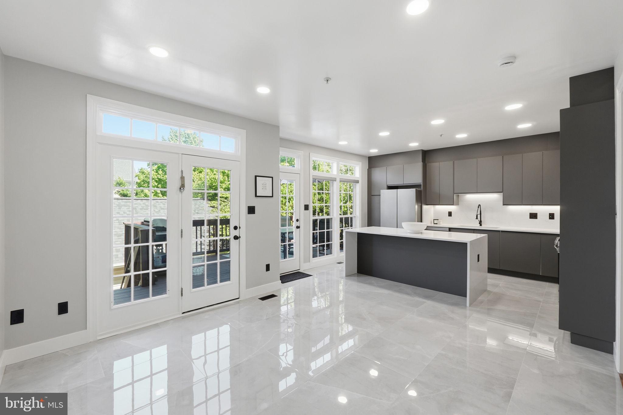 COMING SOON 6/19. Completely transformed and truly move-in ready, this beautifully updated end-unit townhome offers one of the largest floor plans in the community thanks to a rare two-foot bump-out that adds generous living space on every level. Pride of ownership shows from the moment you walk in.
Since 2024, this home has been renovated top to bottom. A stunning, fully reimagined kitchen anchors the main level with quartz countertops, a designer tile backsplash, and a complete suite of brand-new Samsung appliances—perfect for everyday living and entertaining alike. The full hardwood flooring throughout has been professionally resurfaced and polished to a like-new shine, while all bedrooms feature brand-new luxury vinyl plank (LVP) flooring.
No detail was overlooked. The entire home has been freshly painted, fitted with more than 30 new recessed lights, and outfitted with sleek new black fixtures and outlets throughout for a clean, modern aesthetic. Both the master bathroom and guest bathroom have been fully renovated, including stylish stand-up shower conversions for a spa-like feel.
Major systems give peace of mind for years to come, with a recently replaced roof and a newer HVAC system. With a two-car garage and a smart, spacious layout across multiple finished levels, this home delivers comfort, style, and value rarely found at this price point.
Set in the heart of sought-after Clarksburg, you're just minutes from I-270 for an easy commute to Rockville, Bethesda, and Washington, D.C. Shop and dine to your heart's content at the nearby Clarksburg Premium Outlets, home to 90+ brand-name stores, a Market Hall dining pavilion, and family-friendly amenities. Outdoor lovers will treasure quick access to Black Hill Regional Park, where Little Seneca Lake offers boating, fishing, miles of scenic trails, and weekend adventure right around the corner.
This is the rare turnkey home that combines a premium, oversized floor plan with a full slate of recent, high-quality upgrades—all in one of Montgomery County's most convenient and amenity-rich locations. Don't miss it.
