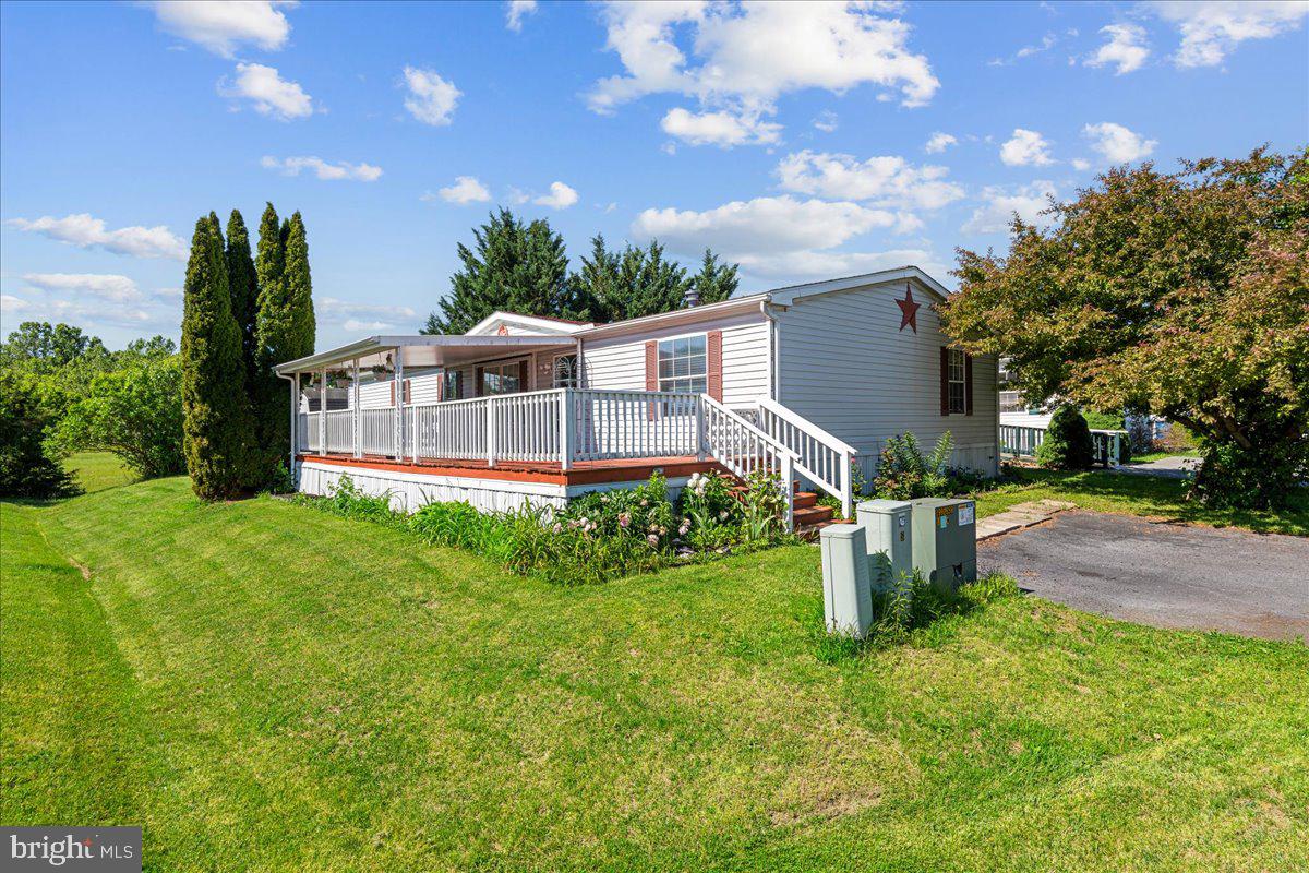 Spacious single level in a very convenient location. Close to shopping and the interstates. Open floorplan features open kitchen, dining and family room. Family room features a cozy fireplace. Split floorplan features an owner's suite adjacent to the living room and two spacious bedrooms and a full bath on the opposite side of the house. the large welcoming covered front deck is great for outdoor gatherings!