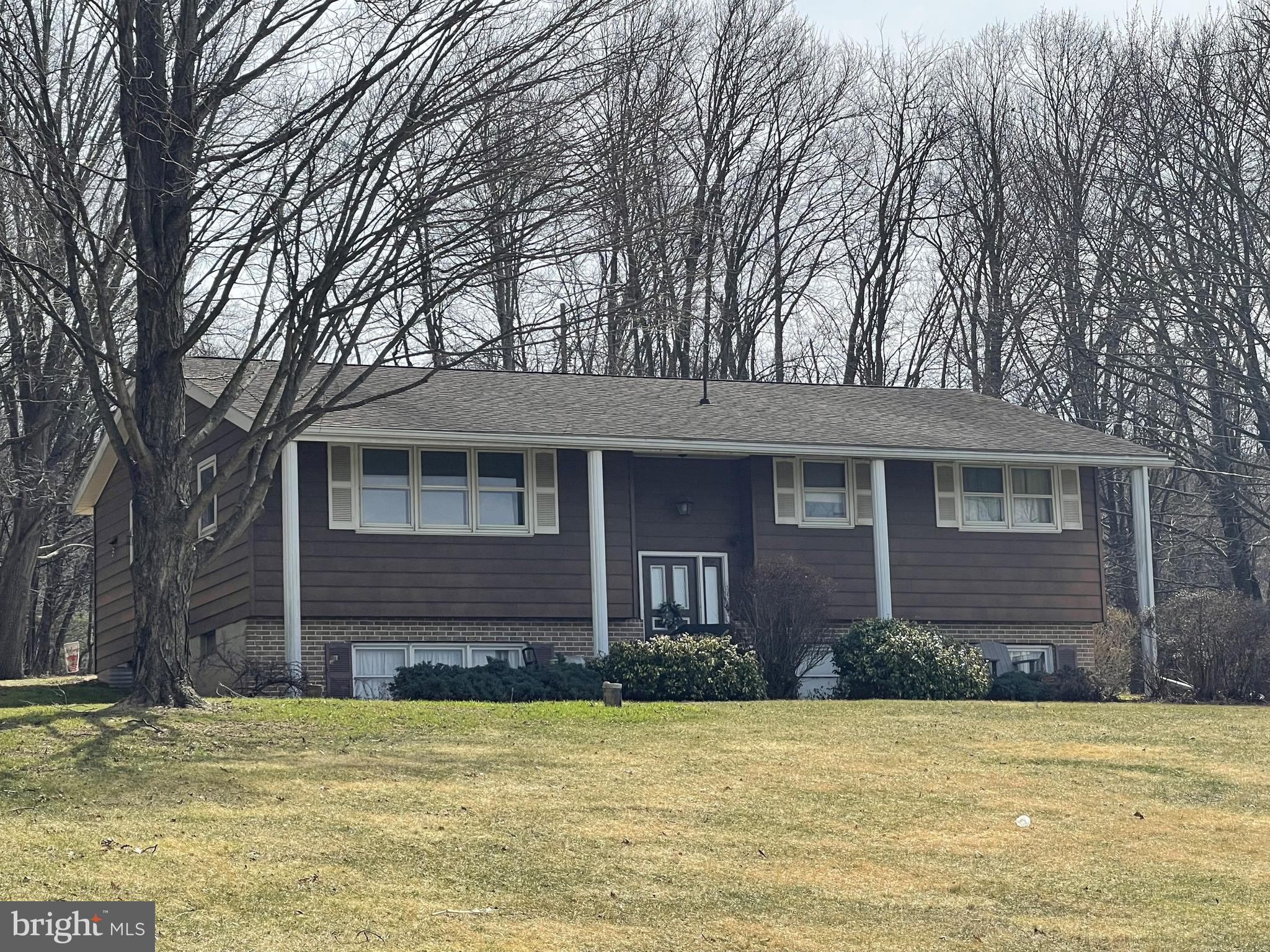 BiLevel refreshed and move in ready. 3 Bed, Full  Bath and large Eat In Kitchen. Large 1.8 acre lot offers privacy and beautiful views. Storage shed contains a riding mower included.