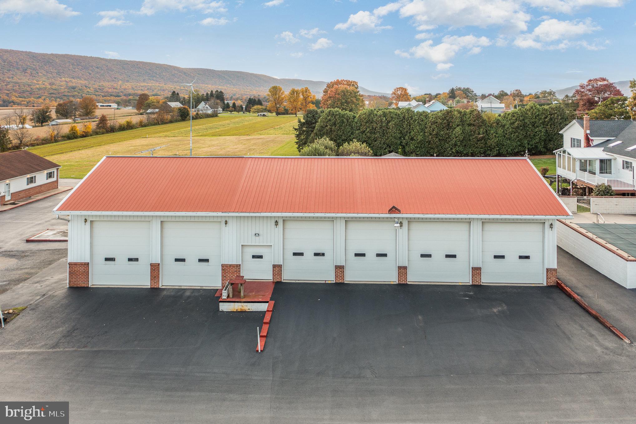 Only minutes away from Interstate 81 exit 112, built in 1993, this six bay truck garage served as the home of Morgan Oil Inc for many years. This garage complete with a separate electric service, heating system, mezzanine for storage, air compressor and air lines to each bay. Truly a mechanic's dream, this garage has endless possibilities!! Included in the sale is a move-in ready 3400 sq ft 5-bedrooms and 4-bathrooms split level home. Well maintain home includes new roof, new central AC and much, much more!!!

***Oil company office and active diesel fueling station share an easement for access to Route 25.***

***A recent annexation of the truck garage will add 3563.7 square ft or 0.082 acres to the existing 1.2 acre making the total an estimated 1.282 acre. The sale will be contingent upon approval of recent annexation.***

***Seller is/and or related to a Realtor.***