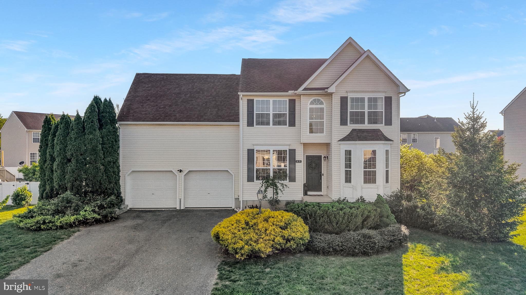 Welcome to this charming home in Pinehurst Village in Felton! Imagine coming home, you walk up the nicely landscaped walkway, and inside you’re greeted by brand-new flooring throughout the entire first floor, with your family sitting in the cozy living room to the right, the smell of dinner in the air, and tableware is set, ready for you to sit down and eat in the open dining area to the left. Dinner is being prepared in the eat-in kitchen with the newer stainless steel appliances, overlooking the inviting family room with beautiful views of the lush backyard, so you can still see the dog rolling in the grass. Just off the kitchen, you have access to the two-car garage where the extra storage is, and a convenient half bath for yourself and guests.

As you go upstairs, you enjoy the natural light that fills the two-story layout, and the softness on your feet from light-colored carpeting that complements the entire level. The primary suite, located to the right, offers built-in speakers to hear the soft music playing after a long day at work, a walk-in closet with custom shelving to get changed into something more comfortable, and a private en suite bath complete with a walk-in shower and an upgraded dual vanity with refreshed lighting and mirrors to wash up before dinner. Two additional bedrooms sit to the left of the hallway, each warm, welcoming, and filled with natural light, where the children do homework or read before dinner.  The full bathroom with a tub/shower combo is located just beyond the primary suite for added convenience for the children to get ready for dinner, also.

At the end of the hall, you’ll find access to a bonus space above the garage—perfect for a potential fourth bedroom, playroom, entertainment area, or guest retreat. The owners have even upgraded the electrical system to support your plans.

This home offers comfort, thoughtful upgrades, and room to grow—come see all it has to offer!