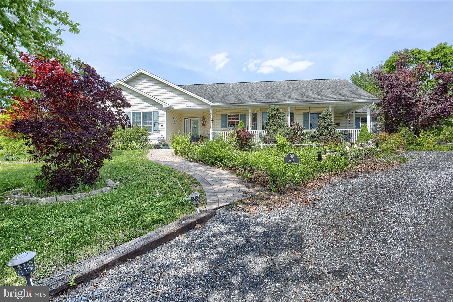 Wake up, have your coffee and look at the mountains. Great views from the front and back of the home. 3 bedroom, 2 bath, one owner, one story home with hardwood floors throughout on an almost 2 acres of land. You do not wish to miss this one. Great lot with beautiful trees. Everything was hand chosen by the owner, just to name a few,  the kitchen cabinets are handmade and it is 2 by 6 construction. It has a true full basement, it is huge with two entrances. Outside you find a very big 2 story barn  and a shed. Great area to spend time outside in the big back and front yard. The owner had the home built and loved living here, they took amazing care of it and are looking forward to passing it on to the new buyer. Come by and see for yourself.