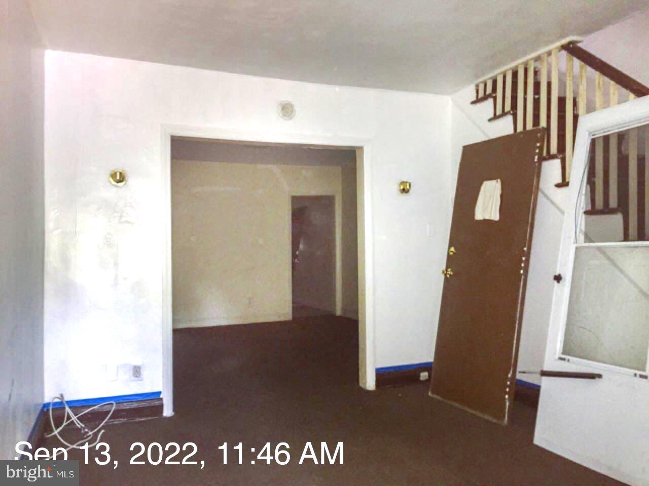 RENOVATION OPPORTUNITY WITH THE POTENTIAL FOR 3 FINISHED LEVELS AND OFF STREET PARKING!  Main level with a spacious living room, separate dining room, and kitchen, upper level with 3 true bedrooms and 1 full bath, a full basement that can be finished to add more living space, and a large fenced yard with a parking pad.  Rear yard backs to green space for extra privacy.  Ideal location - within 1 mile of both Johns Hopkins University and Morgan State University.  Sold As-Is!  Seller will make no repairs.  CASH OR HARD MONEY ONLY!