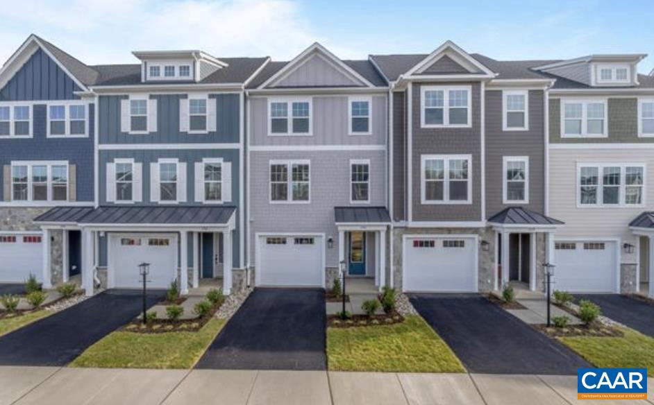 This home is located just behind Halsey Ave. in Brookhill. Can not be found on the GPS yet.  Luxury, Spacious and Brand New townhome in The Grove at Brookhill, ideal for tenants seeking comfort, convenience, and low-maintenance living just off Route 29N. The open, light-filled floor plan features a modern galley kitchen with granite countertops and white cabinetry, durable LVP flooring, and 9-foot ceilings on the main level. A maintenance-free deck and attached one-car garage add everyday convenience. The main and basement levels each offer a private bedroom suite with a full bath perfect for roommates, guests, or work-from-home flexibility. With four bedrooms total, a good-sized backyard, and mountain views from select windows, this home offers space and privacy rarely found in townhome rentals. Enjoy nearby wooded trails, parks, and green spaces, with UVA, the airport, shopping, dining, and downtown Charlottesville just minutes away.
