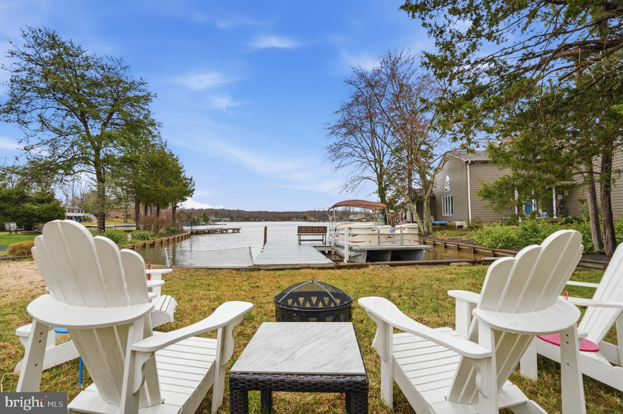 Welcome to lakefront living at its finest at 1353 Lakeview Parkway. With 62 feet of waterfrontage, breathtaking lake views, a private beach, and your own dock, this home offers the perfect everyday escape. Inside, you’ll find 3 bedrooms and 2 full bathrooms, thoughtfully designed to maximize comfort and capture the beauty of the water. The living room, kitchen, and dining area all showcase stunning lake views, creating a bright and inviting space ideal for both relaxing and entertaining. A cozy wood-burning fireplace adds warmth and charm for those cooler days by the water. The primary suite is a true retreat opens directly to the deck—perfect for enjoying your morning coffee with a view. Two additional bedrooms offer comfort for family or guests and are conveniently served by a full hall bathroom. Whether you're looking for a weekend getaway or a full-time waterfront lifestyle, this home delivers the best of lake living right outside your door.

Located in a private, gated, secure community, Lake of the Woods offers anything and everything you could want. Home to two lakes (the 550-acre main lake and a 35-acre "fishing lake"), a golf course, an equestrian center, a fire and rescue department, and a church all within the gates, Lake of the Woods simply has it all. Whether your passion is boating, water skiing, kayaking, golfing, horseback riding, or simply taking in the breathtaking views from the clubhouse while enjoying a fabulous meal, from your deck or yard, or from one of the beaches, you won't be disappointed! Perhaps you'd like a game of bridge or volunteer your time and talents...Lake of the Woods offers more than 60 clubs and organizations. Located in a private, gated, secure community, Lake of the Woods offers anything and everything you could want. Home to two lakes (the 550-acre main lake and a 35-acre "fishing lake"), a golf course, an equestrian center, a fire and rescue department, and a church all within the gates, Lake of the Woods has it all. Whether your passion is boating, water skiing, kayaking, golfing, horseback riding, or simply taking in the breathtaking views from the clubhouse while enjoying a fabulous meal, from your deck or yard, or from one of the beaches, you won't be disappointed! Perhaps you'd like a game of bridge or volunteer your time and talents...Lake of the Woods offers more than 60 clubs and organizations from which you may choose to become involved. Located in Orange County, we are fortunate to enjoy low real estate taxes. Coupled with home prices ranging from $200,000+ to over $2,000,000, Lake of the Woods is the perfect community for full-time residents and weekenders. But don't take my word for it, please come see for yourself! I will gladly give you a tour of Lake of the Woods by boat and by car so that you may experience what's to love in Lake of the Woods! Located in Orange County, we are fortunate to enjoy low real estate taxes. Coupled with home prices ranging from $200,000+ to over $2,000,000, Lake of the Woods is the perfect community for full-time residents and weekenders. But don't take my word for it, please come see for yourself! I will gladly give you a tour of Lake of the Woods by boat and by car so that you may experience what's to love in Lake of the Woods!