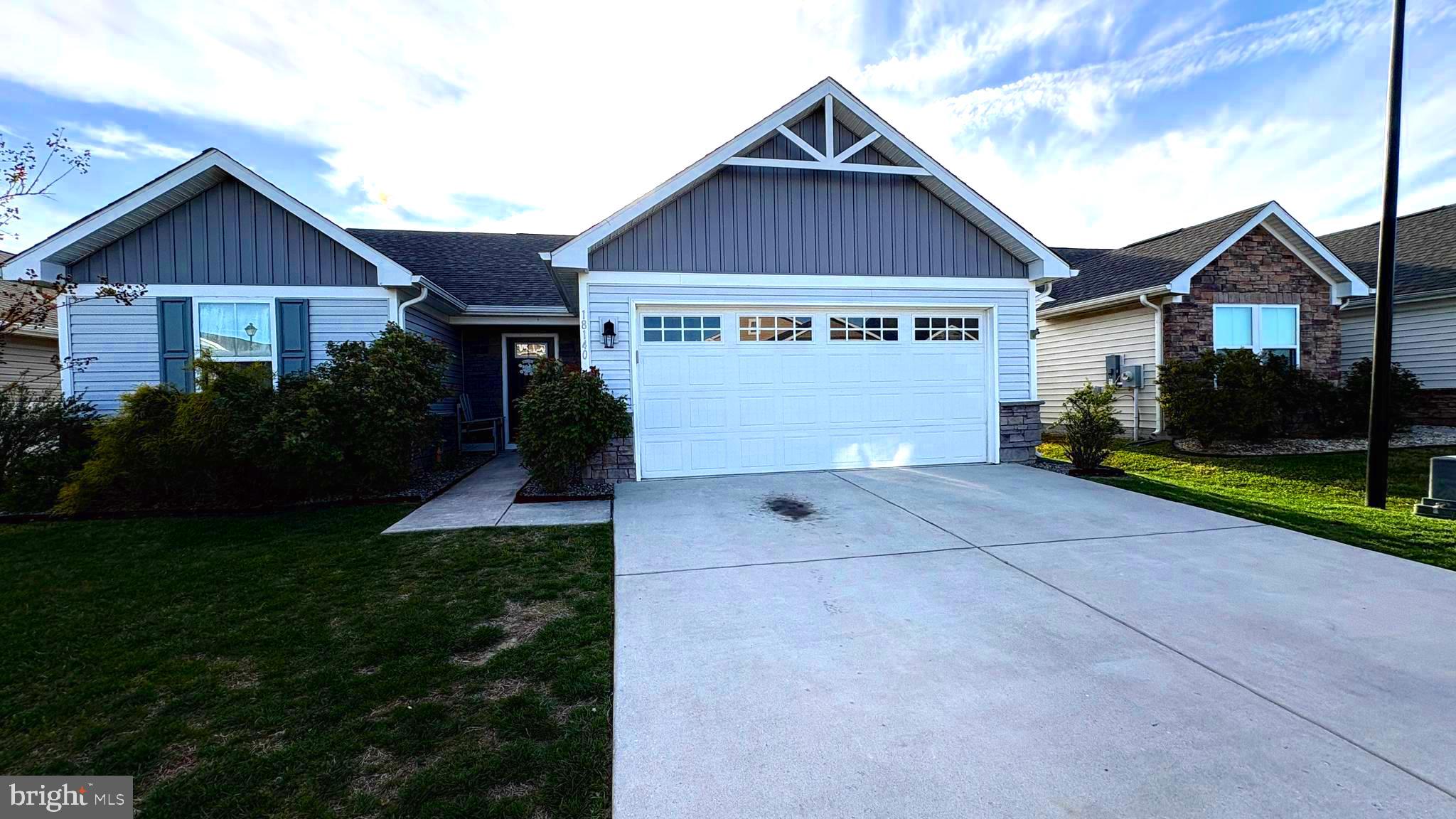 Extended two car garage, all one level living, tankless  water heater, 5 foot white vinyl fencing in rear, Water softner, Under cabinet LED lighting with  remote control. some rooms recently painted. Ring doorbell with backyard cameras.Close to shopping, healthcare, and not far from beaches. Community pool and clubhouse.