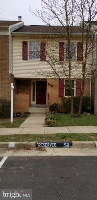 Stunning 3 finished level townhouse with open floor plan. Seller to install all new windows (soon). New hardwoods/fresh paint.. Gourmet kitchen with all new appliances, cabinets, counters, lighting. Separate dining room. Step down living area w/built ins surrounding fireplace.   Lower level family room with second fireplace, walkout to private, fenced yard and (soon to be) new sliding glass door.