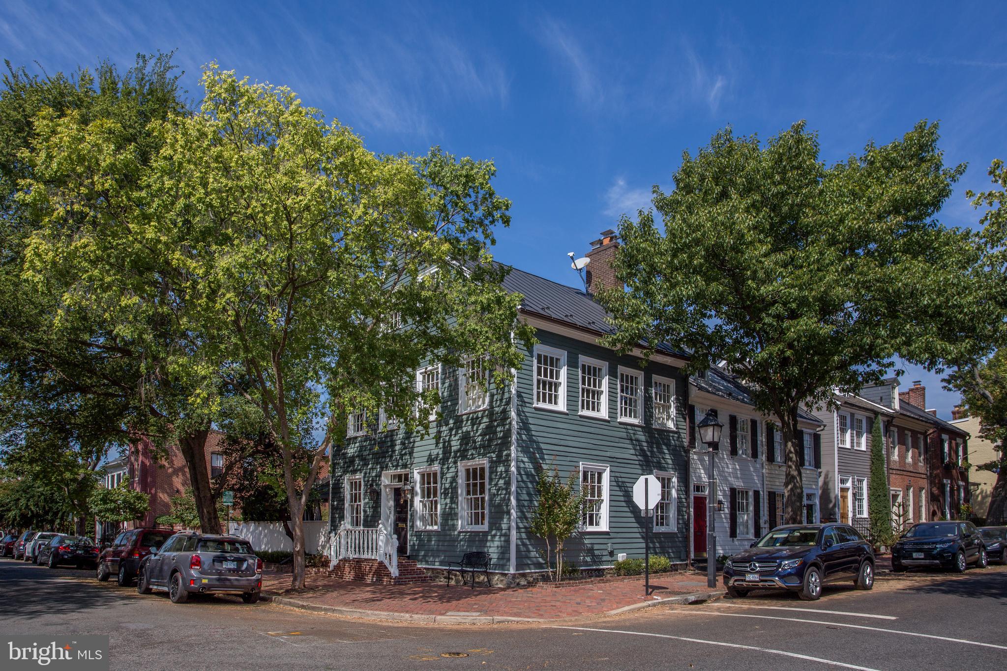 An Old Town Gem dating back to c 1790 with abundant light on three sides! Original heart pine floors and detailed moldings, 2 fireplaces, chef's kitchen opening to a side porch and magnificent garden with fountain. Four spacious bedrooms plus a charming study, three full and two half  bathrooms.  Lower level family room with attractive wine cellar.