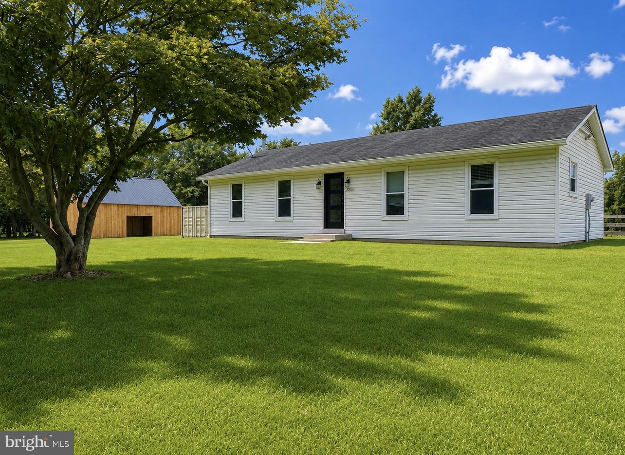 Moose Meadow is a practical country farmette offering main-level living on nearly 4 acres, perfectly designed for equestrian, hobby farming, and animal enthusiasts. Nestled in a tranquil setting, set back from the road, this property provides the perfect blend of privacy and convenience, just 6 miles from downtown Purcellville & 10 miles from Middleburg. As you enter the house, you'll be greeted by hardwood floors that flow throughout the main living areas. The kitchen features updated stainless steel appliances, offering both style and functionality. The home boasts three bedrooms on the main level, complemented by two updated full bathrooms. The finished basement, with its own ground level access, expands your living space with a versatile bonus room that could easily serve as another bedroom, or even a home office, complete with an additional full bathroom in the hall for added convenience.  To go above and beyond, there are brand new gutters on the exterior of the home and there is a UV water treatment system along with a water softener.  Step outside to discover a well-equipped horse setup featuring new oak-board fencing, two paddocks split with a new 10'x28' run-in shed, new automatic waterers, a third connecting paddock, and a dry lot that has access to the barn, ensuring your equine companions are comfortable and well-cared for. The brand-new 24'x36' timber frame structure, has a durable metal roof that presents an exceptional opportunity for customization; ideally suited for a two-stall barn with a feed room, tack room, and center aisle, or a four-stall barn with a center aisle, it offers endless possibilities for a horse barn, workshop, garage, or any use. The exterior of the building is complete & the interior will remain a canvas awaiting your personal touch. This property is a rare find, combining modern amenities with the charm of country living. Don’t miss your chance to own this manageable horse property, where you can enjoy the best of both worlds—peaceful rural living with easy access to town. Schedule your private showing today!