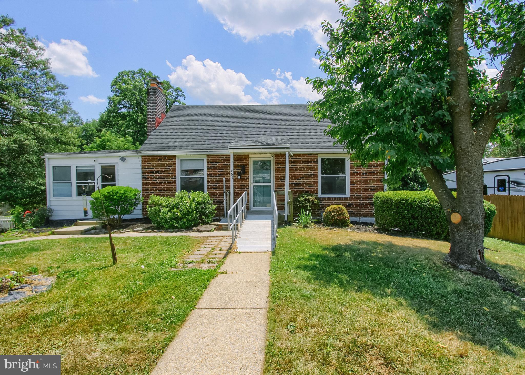 Nestled in the heart of Camp Hill Borough, this charming traditional brick home offers a perfect blend of comfort and community. With three spacious bedrooms and three full bathrooms, this residence is designed for both relaxation and entertaining.   There are 2 bedrooms on the main level with full bathroom.  The screened in porch provides added space for relaxation.  2nd level has a 3rd bedroom, full bathroom, bonus room and walk in closet.  The lower level has a laundry area, and family room that could be used as a 4th bedroom.  Additionally, the lower level has a kitchen and full bathroom.  Enjoy the warmth of the gas fireplace on chilly evenings, while the attached garage and ample off-street parking, both in front and rear of property to ensure convenience for you and your guests. The expansive 0.36-acre lot invites outdoor gatherings or gardening, making it an ideal setting for creating lasting memories. Camp Hill Borough is known for its vibrant community spirit, excellent schools, and beautiful parks, perfect for leisurely strolls or weekend picnics. With easy access to local amenities and public services, this home is not just a place to live, but a place to thrive. Experience the charm and warmth of this wonderful neighborhood-your new home awaits!