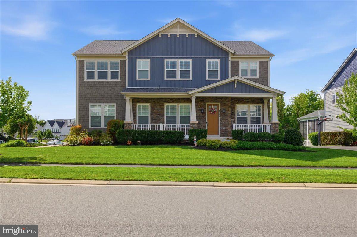 Luxury Living in Willowsford | 6 Bedrooms | 5.5 Bathrooms | Main-Level Suite | Finished Walk-Up Basement |

Welcome to 40777 Foxtail Fields Drive, a beautifully appointed luxury home in the highly sought-after Willowsford community in Aldie, Virginia. Built in 2018 and thoughtfully upgraded throughout, this exceptional residence offers over 5,200 square feet of refined living space designed for both everyday comfort and elegant entertaining.

With 6 spacious bedrooms, 5 full bathrooms, and 1 half bathroom, this home features a versatile floor plan ideal for modern living, multi-generational households, or extended guest stays.

The upper level offers 4 generously sized bedrooms, including a luxurious owner’s suite with a spa-inspired bathroom and expansive walk-in closets. One of the secondary bedrooms feature private en-suite bath, while the 2 additional bedrooms are connected by a well-designed Jack-and-Jill bathroom. The convenient upper-level laundry room adds everyday functionality.

On the main level, a private bedroom with a full bath provides the perfect setup for guests, in-laws, or a dedicated home office.

At the center of the home is a stunning gourmet kitchen featuring upgraded cabinetry, granite countertops, stainless steel appliances, a gas cooktop, wall oven and microwave combination, designer backsplash, and an oversized center island that flows seamlessly into the spacious family room. The dramatic floor-to-ceiling stone fireplace creates a warm and inviting focal point.

Beautiful hardwood flooring, elegant architectural details, abundant natural light, and tasteful finishes can be found throughout the home.

The fully finished walk-up basement offers exceptional flexibility with a large recreation area, custom wet bar, private bedroom and full bath, dedicated gym and fitness room, and separate washer and dryer hookups, making it ideal for an in-law suite, long-term guests, or additional entertaining space.

Additional highlights include:

• Extended driveway and side-load garage
• Premium corner lot
• Floor-to-ceiling stone fireplace
• Iron baluster staircase
• Hardwood flooring throughout main living areas
• Custom wet bar
• Walk-up basement
• Dedicated gym and fitness room
• Main-level bedroom with full bath

Located within one of Northern Virginia’s premier lifestyle communities, Willowsford offers resort-style amenities including pools, fitness centers, scenic walking trails, parks, community events, and its renowned farm-to-table lifestyle.

This is a rare opportunity to own a move-in-ready luxury home that combines space, functionality, and timeless design in one of Aldie’s most desirable communities. Schedule your private tour today.