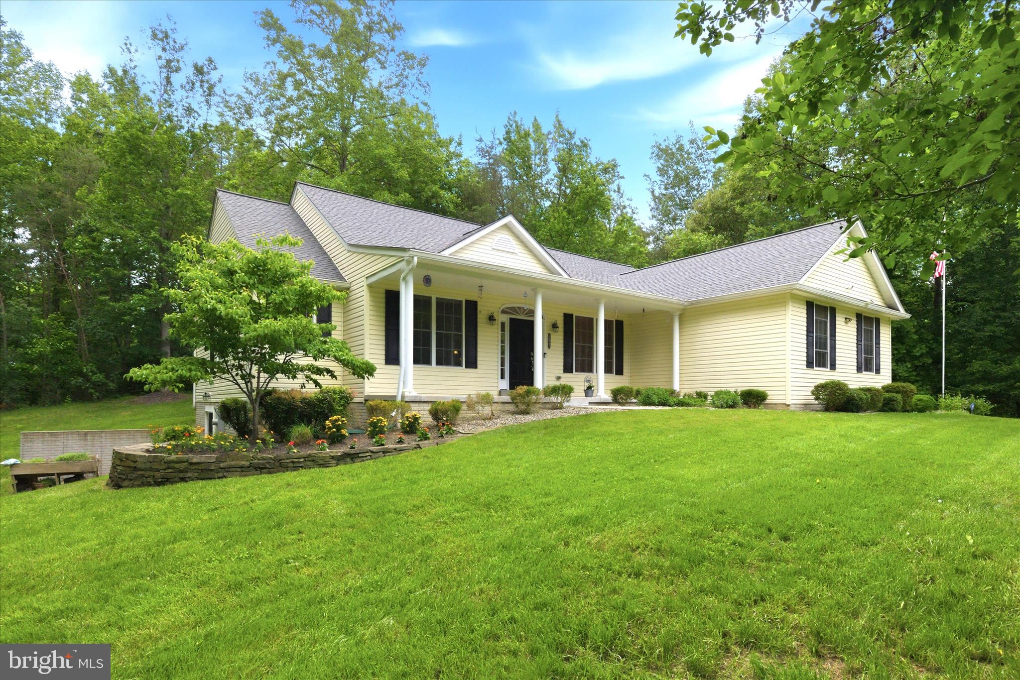 Welcome Home. Immaculate Rambler on 3 acres in Hughesville. Enjoy the privacy and serene setting paired with single level living. Home features 3 bedrooms, 2 full baths, spacious living room with eat-in kitchen and separate formal dining room. Create your final touches in the sprawling basement with bathroom rough in and space for multiple bedrooms, in law suite or entertaining. Well maintained manicured lawn, sprinkler system, mature trees, paver patio and walk out basement entry. Property also has an extended driveway and an oversized two car garage. No HOA!
