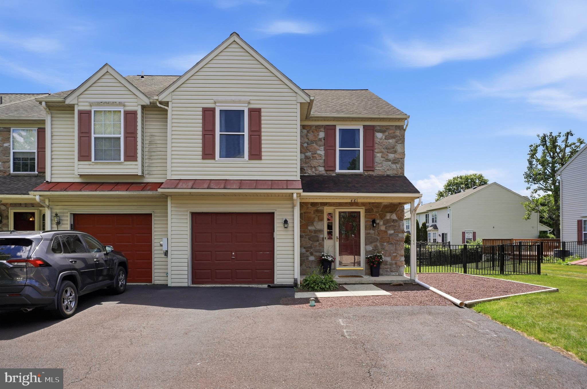 Professional Photos expected 6/25/26!

Welcome to 461 Berkshire Drive, a meticulously updated end-unit townhome in Banbury Crossing within the highly regarded Souderton Area School District. This property offers the distinct advantage of no HOA fees. Set apart from many neighboring homes, it features a double-wide driveway accommodating 3–4 vehicles, a one-car garage, and an expansive fully fenced backyard, approximately twice the size of typical lots, backing directly to Township-maintained open space for enhanced outdoor enjoyment  

The interior presents an open and inviting layout with durable solid-surface flooring throughout the main level and abundant natural light. Recent upgrades include a heated four-season room addition (2025), a new deck (2023), a professionally finished basement (2022), replacement windows (2023), a tankless water heater (2024), an updated powder room (2026), and new aluminum fencing.  

Major systems have been thoughtfully maintained, with a roof replacement in 2018 and a new central air conditioning system in 2020, ensuring long-term comfort and peace of mind.  

Upstairs, the primary suite features a vaulted ceiling and ample closet space, complemented by two additional bedrooms, a hall bath, and second-floor laundry. The finished basement provides versatile living space suitable for a recreation room, home office, fitness area, or other functional uses.  

Conveniently located near shopping, dining, parks, and major commuter routes, this residence combines extensive upgrades, generous outdoor space, abundant parking, and the freedom of no HOA fees—representing a rare opportunity in today’s townhome market.