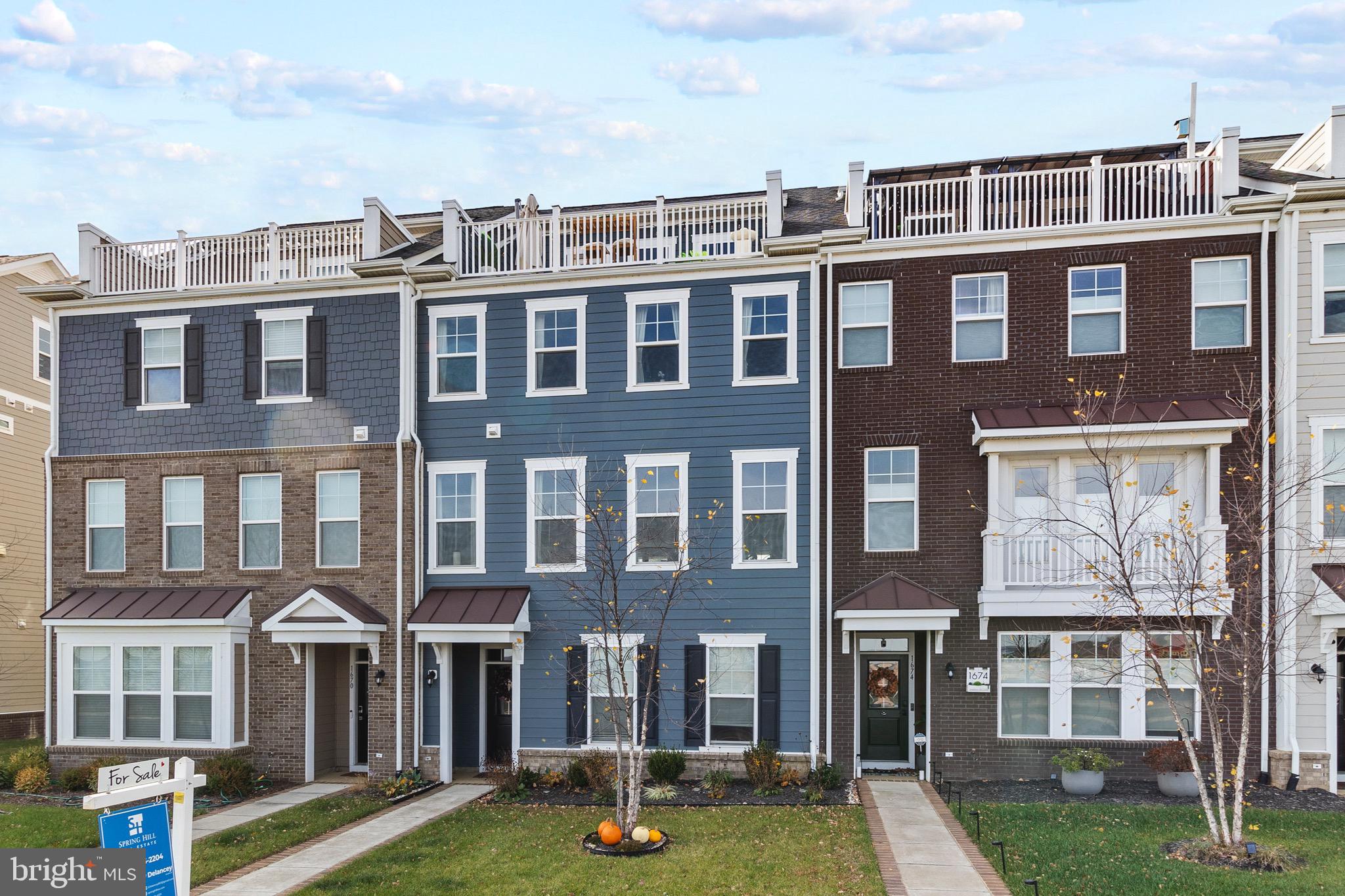 ***$40K PRICE REDUCED*** Don't miss this amazing opportunity. Seller also offering $5K seller credit!!!!
Welcome to luxury living in the highly sought-after community of Potomac Shores! This stunning 4-story townhouse offers modern design, spacious living, and resort-style amenities right at your doorstep. 
Featuring luxury vinyl plank flooring, the main level boasts a gourmet kitchen complete with stainless steel appliances, a gas cooktop, double oven, and a large entertainer’s island that flows seamlessly into the dining and living areas. Enjoy your morning coffee or evening grilling on the deck conveniently located off the kitchen.

The lower level offers versatility with an office space, flex room, and convenient drop zone, ideal for today’s lifestyle. Upstairs, you’ll find three generously sized bedrooms, including a serene primary suite with a spacious walk-in closet and a spa-like ensuite bathroom.

The fourth floor is an entertainer’s dream—featuring additional flex space currently used as a movie theater, plus a walkout rooftop terrace designed for relaxation and hosting unforgettable gatherings.
Additional highlights include a two-car garage, a driveway with space for two more vehicles, and plenty of storage throughout.

Located in the vibrant Potomac Shores community, enjoy access to two pools, a social barn, sports complex, community schools, scenic trails, and the prestigious Jack Nicklaus Signature Golf Course.