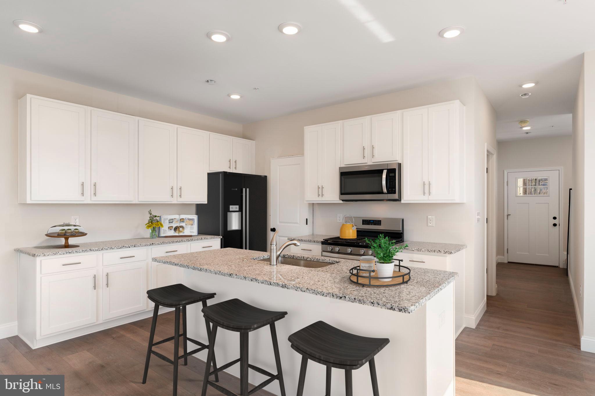 Located in the heart of Perkasie, The Winchester is a beautifully designed three-story townhome, with a detached one car garage.  Enter the home through a welcoming covered front porch and be greeted by an ideal open-concept living space.  Perfect for entertaining friends and family, this spacious kitchen includes quartz countertops, gold hardware, and a large center island overlooking the great room and dining area.   A flex room is also located on the first floor: your dream may be a home office or a designated play area!  Oak-tread stairs lead you to the second floor where you will find two generously sized bedrooms with walk-in closets, a full bathroom and a laundry closet. The third floor is your private retreat!  The spacious Owner’s Suite includes a full bath with a large tile shower, cultured marble topped vanity and a sizeable walk-in closet. 

For modern convenience, the detached garage is equipped with a 100-amp subpanel, making it ready for your electric car charger. 

*Note: Photos are representative.

HOMESITE B26