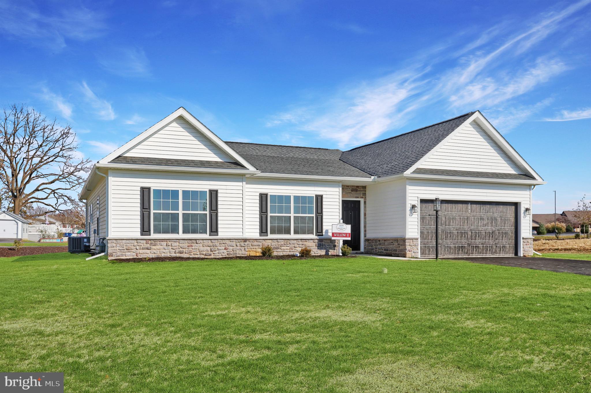 Welcome to One-Level Living at Its Finest – The Willow II at Meadow Lane Farms. THIS HOME IS TO BE BUILT on any of our spacious lots! The Willow II offers a spacious, open ranch-style floor plan designed for comfort and convenience—all on one level. Located in Meadow Lane Farms, this to-be-built home can be customized and built on the lot of your choice in this premier Lebanon County community. This thoughtfully designed home features a designer kitchen with a center island, granite countertops, maple wood cabinetry with soft-close doors and drawers, a walk-in pantry, natural gas cooktop, stainless steel appliances, and recessed lighting. The optional sunroom adds even more living space, ideal as a bright dining area or cozy sitting room, complete with a vaulted ceiling and abundant natural light. The floor plan includes 3 bedrooms, 2.5 bathrooms, a study/den, and open-concept living and dining rooms. The primary suite offers French door entry, a private en-suite bath with a 5-foot walk-in shower, a large walk-in closet, a second clothing closet, and additional linen storage. Additional highlights include a two-car attached garage, rear patio, energy-efficient natural gas utilities, and public water and sewer. Set on 185 acres of scenic farmland, Meadow Lane Farms features walking trails with access to Gloninger Woods Park and the Rails to Trails network. The community is just minutes from Routes 422 and 72, offering convenient access to shopping and easy commutes to Harrisburg, Hershey, and Lancaster. Open House Hours: Saturday & Sunday: 11 AM – 4 PM, Monday & Friday: 1 PM – 4 PM, Wednesday: 4 PM – 7 PM We welcome END loans and are VA & FHA approved! Come explore your new forever home at Meadow Lane Farms!