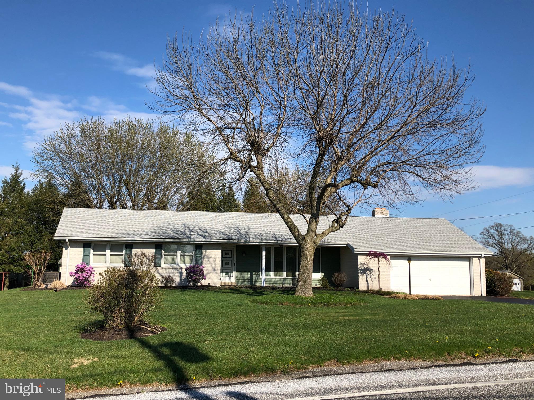 Country quiet, yet quick commute to Rt30 and small-town conveniences. Solid split-rock rancher on nice corner lot with views. Easy 1-floor living and room to expand in the full lower level with workshop and outside entrance. Living room, dining room, 1st floor laundry/powder room with patio access, 1st floor family room with split-rock fireplace, master bedroom with full bath and walk-in closet. Finished 2-car garage with walk-up attic access. Large storage shed. Some updates including mechanicals.  windows and newer roof. 1 Year HMS Home Warranty. AGENTS - Please read Agent Remarks!