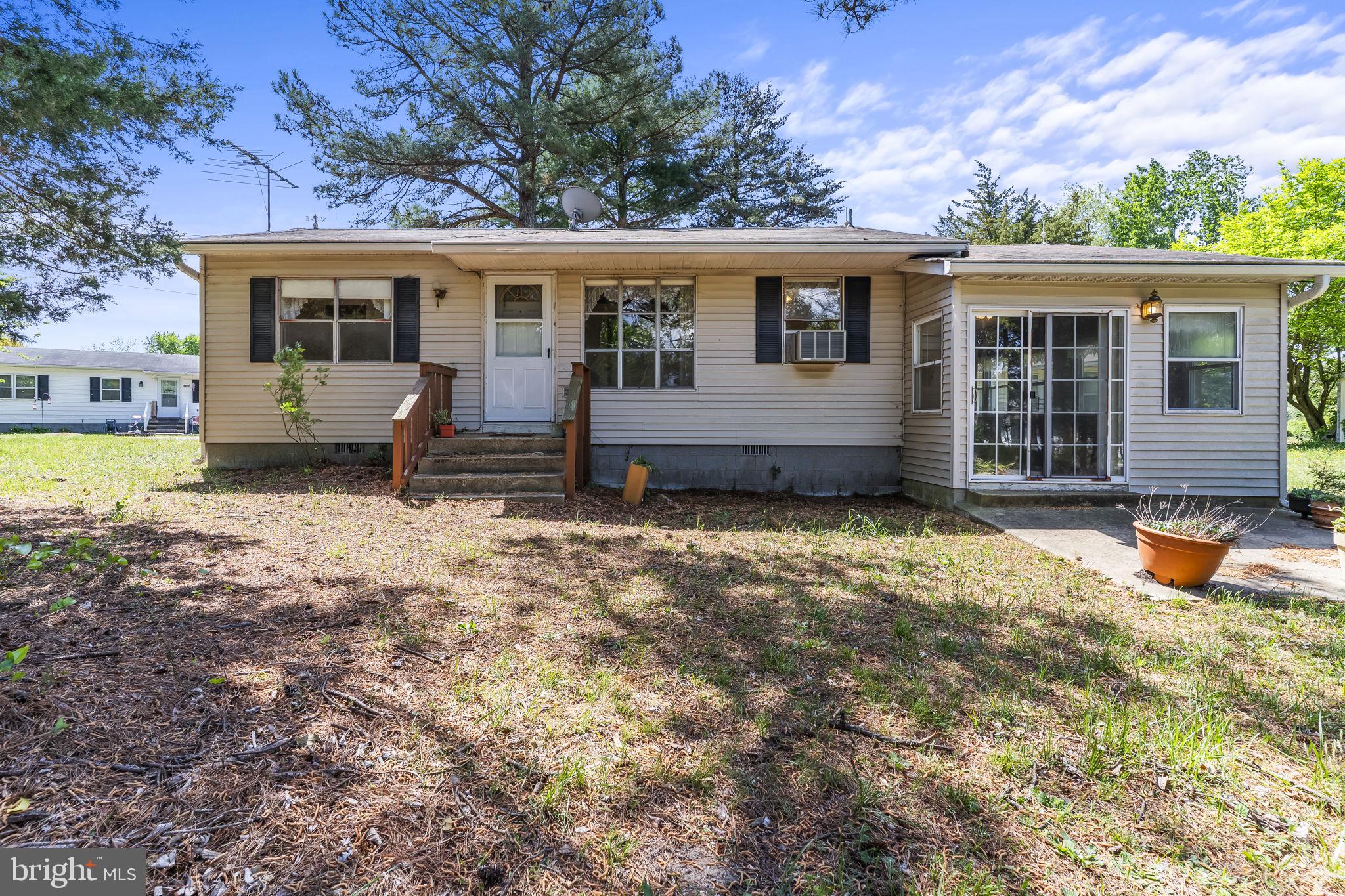 Opportunity meets lifestyle in this charming water-view rambler overlooking the Wicomico River, located in the desirable Mill Point Shores community. Positioned just across the street from waterfront homes, this property offers the feel of waterfront living without the premium price—an ideal opportunity for buyers looking to invest, create a weekend retreat, or customize a home to their vision. This home is being sold strictly AS IS and is priced to reflect the need for updating, making it especially appealing for buyers looking to build sweat equity and add personal touches over time. The layout is simple and functional, featuring an eat-in kitchen with electric stove and refrigerator that flows directly into a spacious sunken family room addition—an inviting space perfect for relaxing, entertaining, or unwinding after a day on the water. 3 bedrooms and 1 full hall bath provide comfortable everyday living.  Set on a generous lot, the outdoor space adds versatility and appeal. A detached 30x12 outbuilding is the party/game room with concrete floor and cinderblock construction is surrounded by windows and equipped with ceiling fans, party lighting, electric outlets, and heating and cooling units (condition unknown), creating a fun and flexible space for gatherings, hobbies, or entertaining. Gutter guards and a roof in good condition provide added value. Mill Point Shores offers a true lifestyle upgrade with its private community beach, pier, and picnic area—perfect for boating, fishing, or simply enjoying time along the Wicomico River. With its water views, location across from the waterfront, and strong potential, this property presents a compelling opportunity for buyers seeking value, location, and lifestyle.