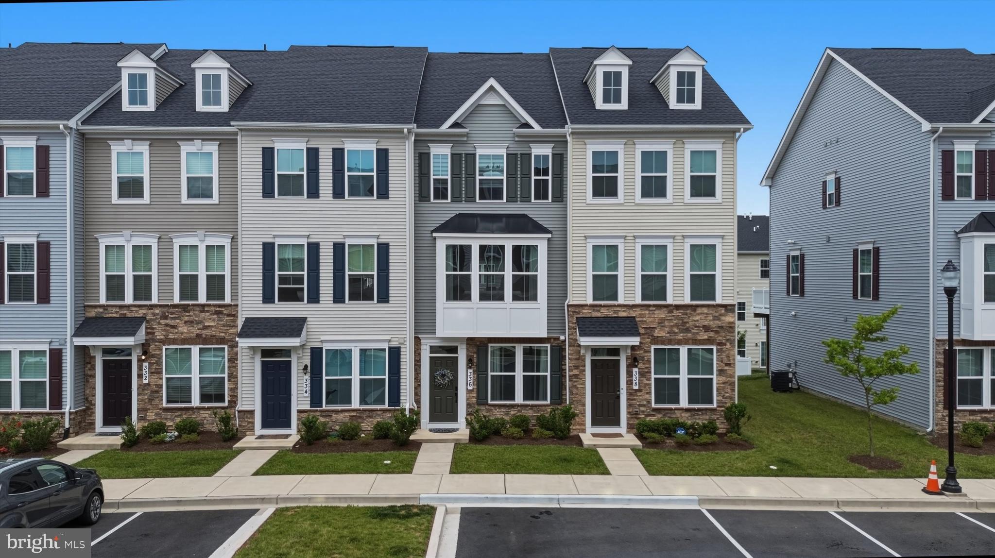 Welcome to this beautifully maintained 3-bedroom, 3 full and 1 half bath townhome offering modern finishes, flexible living space, and an unbeatable Frederick location. Built less than four years ago, this home combines the benefits of newer construction with thoughtful design and everyday convenience.   The entry level provides exceptional flexibility and features a spacious family room, a private bedroom, and a full bathroom—perfect for guests, multi-generational living, a home office, or additional recreation space.   Upstairs, the bright and welcoming main living level is designed for both entertaining and daily living. The kitchen showcases quartz countertops, stainless steel appliances, and an open layout that flows seamlessly into the dining area and living room. Step directly from the dining space onto the Trex deck—ideal for enjoying your morning coffee, outdoor dining, or relaxing evenings.   The upper level offers comfortable private bedroom accommodations, including a spacious primary suite complete with a walk-in closet and attached full bath. A second upper-level bedroom also features its own private en-suite bathroom, creating a functional layout with comfort and convenience in mind.   Ideally located near shopping, dining, and major commuter routes, this home also places you just minutes from all that Downtown Frederick has to offer—including local restaurants, boutiques, entertainment, and community events.   Modern, low-maintenance living in an incredibly convenient location—schedule your private tour today.