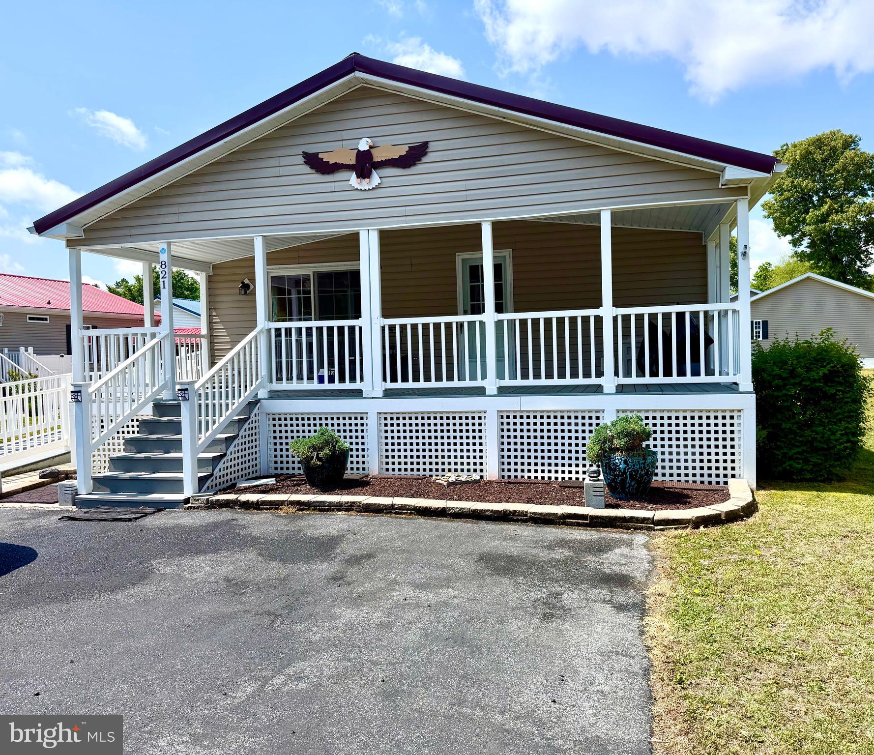 Welcome to the gated community of Village of Cool Branch! This spacious 3-bedroom, 2-bathroom double wide mobile home offers a modern and comfortable living experience. 
Key Features:
- Stainless Steel Appliances: The kitchen comes equipped with sleek stainless steel appliances, making meal preparation a breeze.
- Large Front Porch: Enjoy relaxing evenings on your spacious front porch, perfect for entertaining or unwinding.
- Handicap Ramp: The home includes a convenient handicap ramp for easy access.
- Storage Shed: There's an outside shed for additional storage, keeping your outdoor space organized.
Community Amenities:
- In-Ground Pool: Perfect for cooling off on hot summer days.
- Playground: A great place for children to play and make new friends.
- Basketball Court: Stay active with friendly games right in your community.
Please note that prospective buyers must complete an application for park approval prior to finalizing the sale. 
Don’t miss the opportunity to make this lovely mobile home your own!
