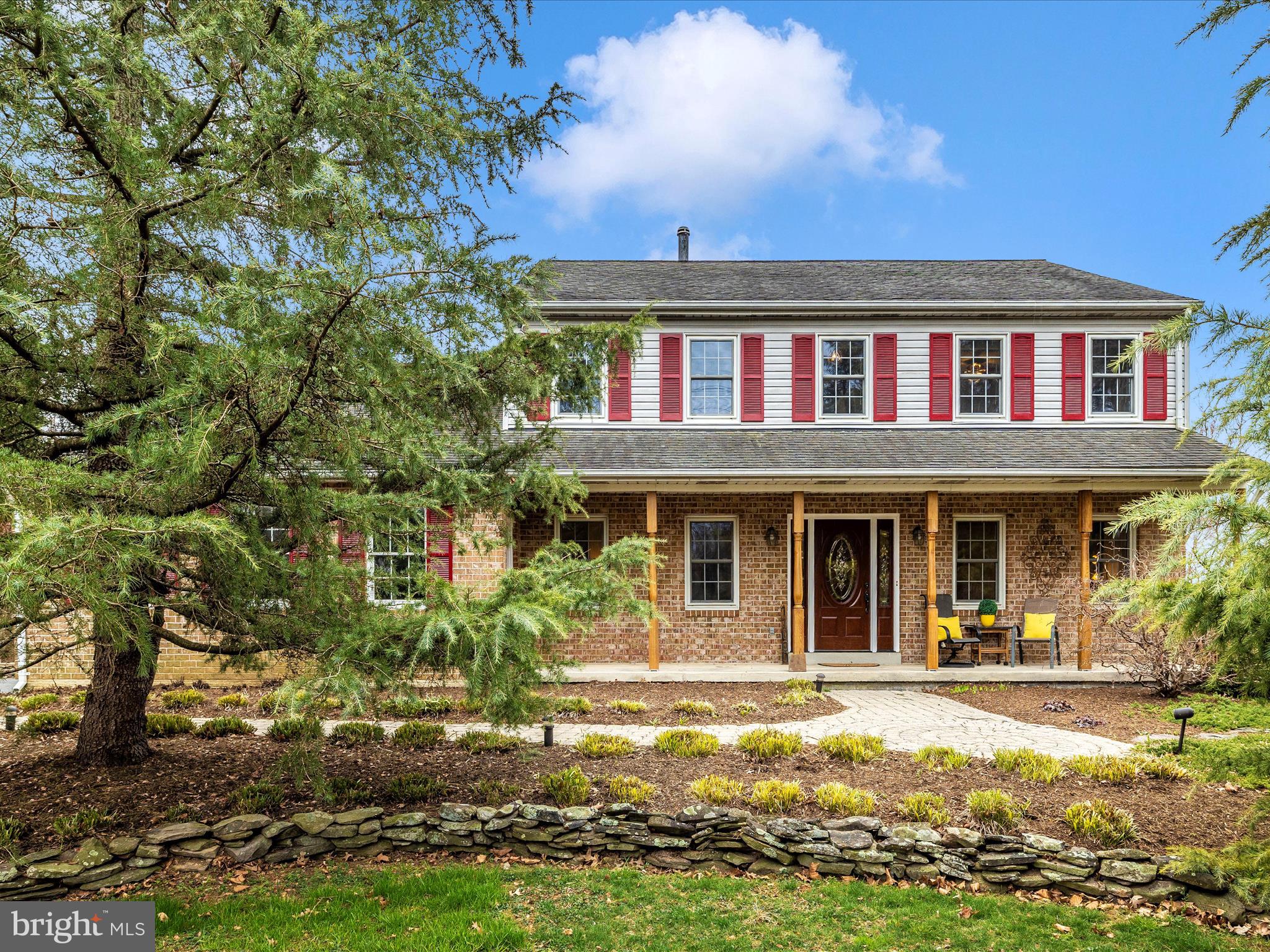 Sought-after Damascus High School.  Pride of ownership and a deep appreciation for this home are evident throughout. Ideally situated on a beautifully landscaped two-acre lot, this traditional front-porch Colonial showcases tasteful, custom updates.
The majority of the main level and the entire upper level feature stunning hardwood Maple flooring, creating a clean and refined ambiance. The main level offers a private office with built-in bookcases, a spacious living room, a formal dining room, and a table-space kitchen adorned with solid cherry cabinetry, exquisite natural stone countertops, and a striking backsplash. Adjacent to the kitchen, the laundry room is thoughtfully designed with cabinetry, a pantry, and a utility sink. The oversized family room, a true showpiece, boasts a custom-designed Girardini  wood-burning fireplace with a handcrafted mantel. This space seamlessly flows into a sunlit, vaulted-ceiling sunroom, which provides access to an expansive Trex deck—perfect for outdoor enjoyment.
Upstairs, the primary suite is a serene retreat, accompanied by three additional bedrooms, all equipped with ceiling fans. The fully renovated primary bath features an oversized shower, dual-sinks, and custom-built cabinetry, with exceptional tile work that exudes elegance. The updated full bath mirrors this level of craftsmanship and style.
The walk-out lower level with wainscotting has been freshly painted and features brand-new carpeting. Recessed lighting enhances the inviting recreation room, making it an ideal space for entertainment. This level also includes an exercise room/den, a full bath with dazzling Spanish tile, two storage rooms with shelving, and a dedicated workshop.
The professionally landscaped two-acre lot is adorned with lush greenery, mature trees, fire pit and exquisite hardscaping. A spacious deck with a gazebo offers breathtaking views, providing a private sanctuary to unwind and enjoy nature.  
Conveniently located between Clarksburg/Germantown and Damascus, this home is close to shopping, dining, and recreational amenities. To top it off, a one-year CINCH home warranty is included for added peace of mind.