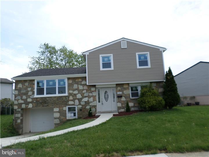 Awesome Split Level, Single Home on a quiet street in very desirable Somerton.This location is close to Mass transit, all major highways, shopping, dining and all that Somerton and the surrounding areas have to offer.This home has had an almost total renovation. 4 bedrooms, 2 full bathrooms and a powder room. New eat in kitchen with stainless steel appliances, granite counter tops, tile back splash and a full size kitchen island.Living room, Dining room and family room with rear porch access to a large corner yard. Hardwood floors, recessed lighting and an electric fireplace. Second floor has a Master bedroom suite with a private bathroom, 2 additional bedrooms with a hall bath. Lower level has 1 bedroom, a laundry area, with outside access and a garage.All windows have been replaced, new roof, new siding, new concrete drive way and walk way to front door.New HVAC system, new garage door, new front entrance door. Neutral paint colors. Come take a look .