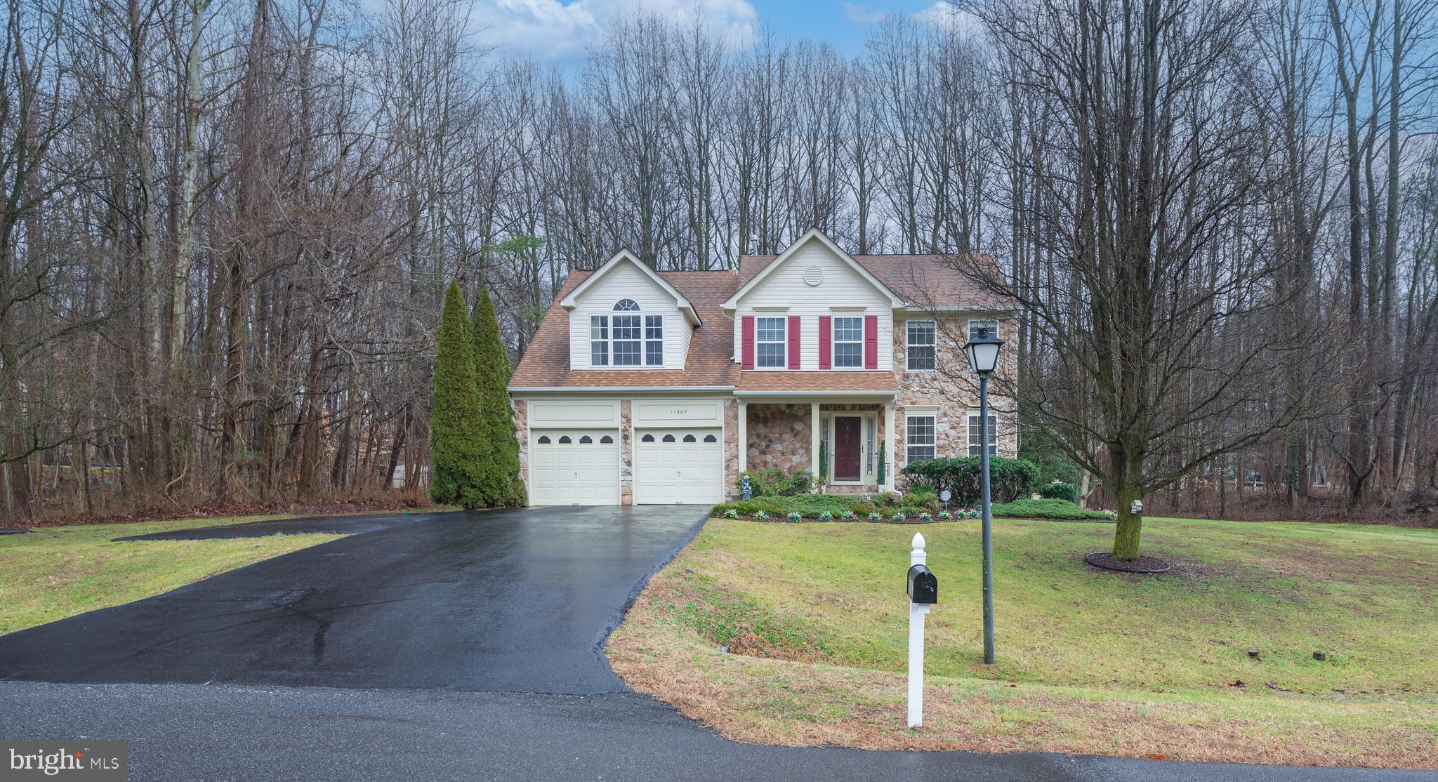 Fantastic opportunity to acquire this well maintained colonial-style residence situated on a 1 acre lot all without an HOA.
 The home showcases hardwood floors in the foyer, living, and dining areas, along with a generously spacious owner's suite featuring an en-suite bathroom. The additional bedrooms are also of considerable size. The fully finished basement boasts a  rec room , half a  bath and a dedicated workout/fitness area.
Owner is offering a One Year Home Warranty .