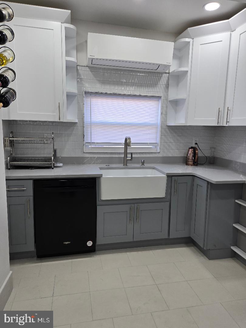 MUST SEE Welcome to this beautiful home located in the heart of Mayfair in Northeast Philadelphia.  This fully renovated home  is move-in-ready and has been completely updated.  The home includes top quality finishes throughout. Features include  painting thru out, engineered hardwood floors 1st & 2nd floors except kitchen and baths, recessed lighting, an open layout, and a tankless hot water heater.
The expanded kitchen offers tiled flooring, recessed lighting, newer appliances, abundant cabinet and courter top space and a peninsula with pendant lighting—perfect for dining, and entertaining. A mini-split heating and cooling system provides year-round comfort in the kitchen area.
The second floor features main  bedrooms with 2 closets, enlarged 2nd bedroom and a stunning  4 piece bath room with tiled walls, a seamless glass shower, soaking tub, and double vanity.
The fully finished basement adds additional living space and can be used as a den, office, or guest area. It includes tiled flooring, a full bathroom with a glass shower,  laundry room or summer kitchen with door to back yard
Major upgrades include a new roof with a 15-year warranty, all-new electrical and plumbing systems, new windows, new front and rear doors, new rear siding.
Conveniently located near shopping, dining, and public transportation. This is a must-see property—schedule your private showing today.