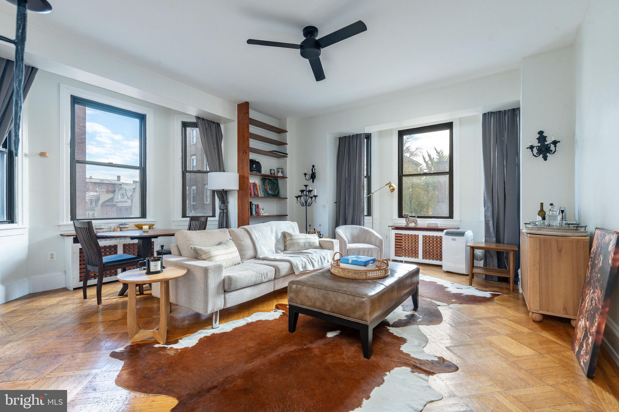 Perfect for investors or future owner-occupants, this spacious, sunlit corner condo in the historic Lenox Condominium offers the ideal blend of turnkey investment and future personal-use potential. The home is leased through June 2026, providing immediate rental income, with the flexibility to move in or re-lease upon expiration.

Featuring high ceilings, hardwood floors, and bay windows with southern and eastern exposures, this residence combines timeless charm with modern upgrades. The 2022 kitchen includes quartz countertops, stainless-steel appliances, a European-style refrigerator, and a porcelain farmhouse sink. Ample storage, an entry vestibule, and ceiling fans in every room complete the space.

The Lenox offers 24/7 doorman service, a central laundry room, and optional storage. Condo fees include heat, hot water, and high-speed internet. Owners may add in-unit laundry and mini-split A/C systems.

Located in Washington Square West, steps from Midtown Village, Walnut Street, and Jefferson Hospital, this home offers classic architecture, modern comfort, and unbeatable Center City convenience.
