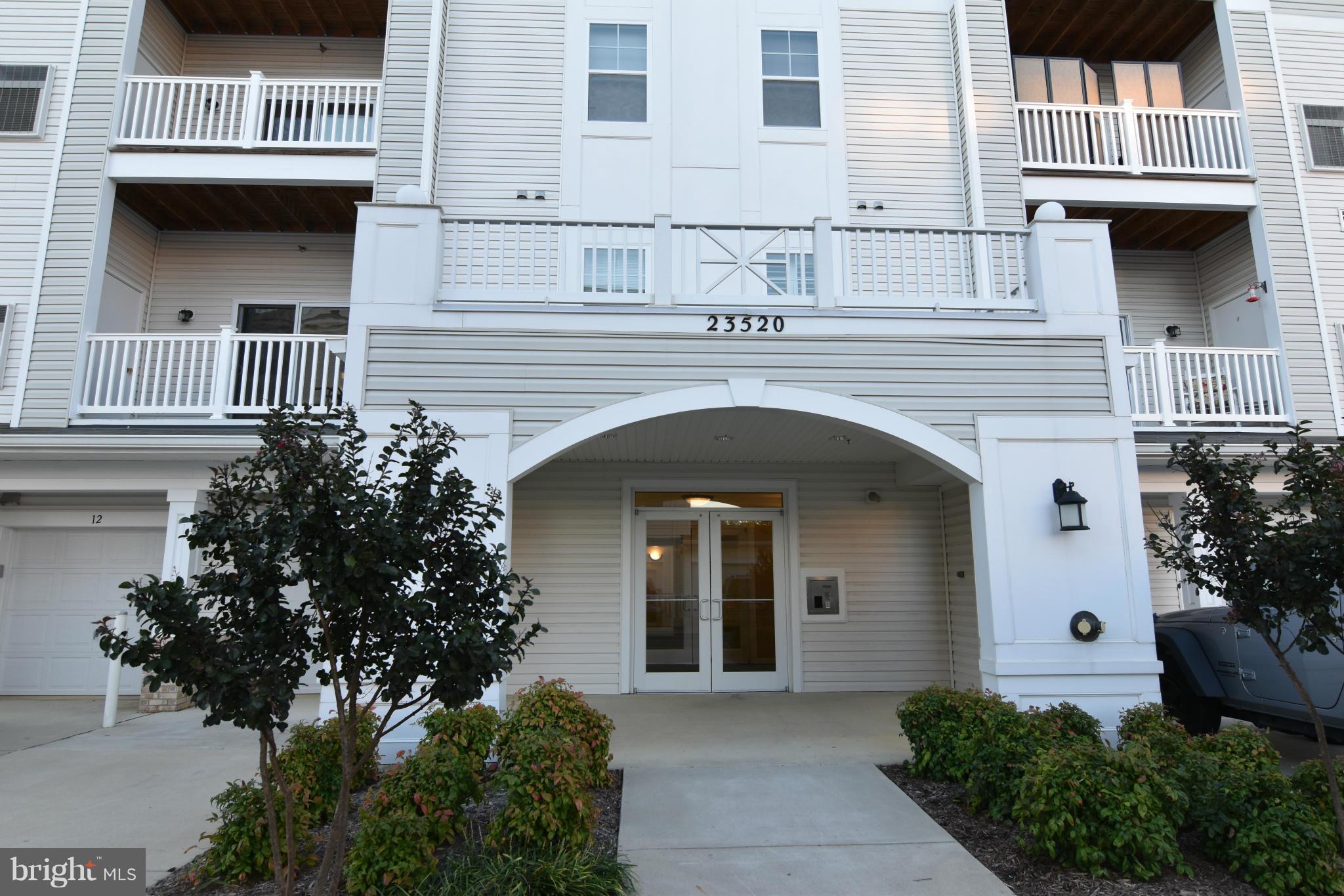 One of the few buildings that backs to the woods!!!!  Open floor plan.  Breakfast bar. 2 bedroom, 2 bath ensign unit.  Garage included - #17!!!!