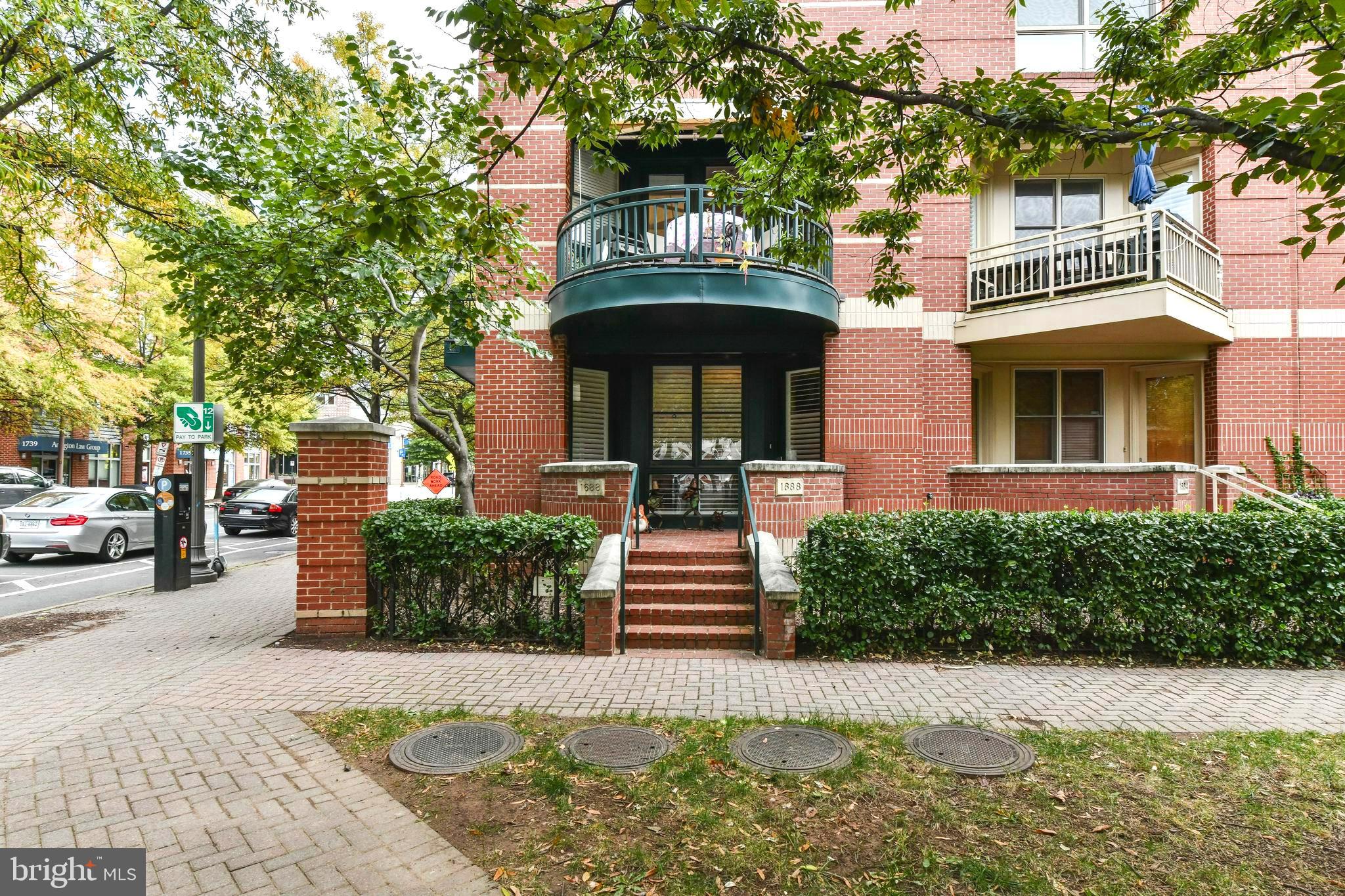 LUXURY end unit town home 3BR, 2.5BA End-Unit all-brick 3200+ sq ft townhome in Bromptons neighborhood of North Arlington*Marble tiled floors greet you with living room & ample sunlight through main windows & unique stone accent wall to compliment space with door leading to garage*Stairway leading to main living level features hardwood floors, recessed lighting & large open living room with patio door leading to private deck with fantastic views of the park & city*Dining area off living room with second patio door leading to second deck & modern kitchen with ample sleek cabinetry, Quartz counters & stainless steel appliances*Oversized primary bedroom features LUX spa-like bathroom with tiled floors, corner soaking tub, modern vanity design & shower*Bedrooms feature hardwood floors in each room & share updated second full bathroom*Enjoy views of the park & city from almost every room in this sunny townhome complete with full two car garage*Perfect for entertaining*Conveniently located within walking distance of the Arlington metro station with plenty of nearby amenities, including grocery stores, restaurants, entertainment & bars* The property has been completely repainted throughout, here are the new pictures.